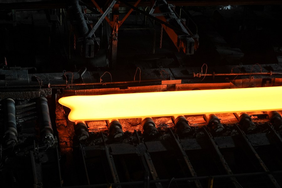 A slab of steel on a hot rolling mill at Nippon Steel's Kashima Plant in Kashima, Japan on Friday, Dec.6, 2024. (AP Photo/Ayaka McGill)