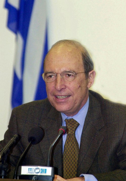 FILE - Greece's Prime Minister Costas Simitis declares a razor-thin victory over conservative opponents following general elections, in Athens on Monday, April 10, 2000. Costas Simitis, a Prime Minister of Greece from 1996 to 2004 and the architect of the country's joining the common European currency, the euro, has died at 88, state TV ERT reports.(AP Photo/Thanassis Stavrakis, File)