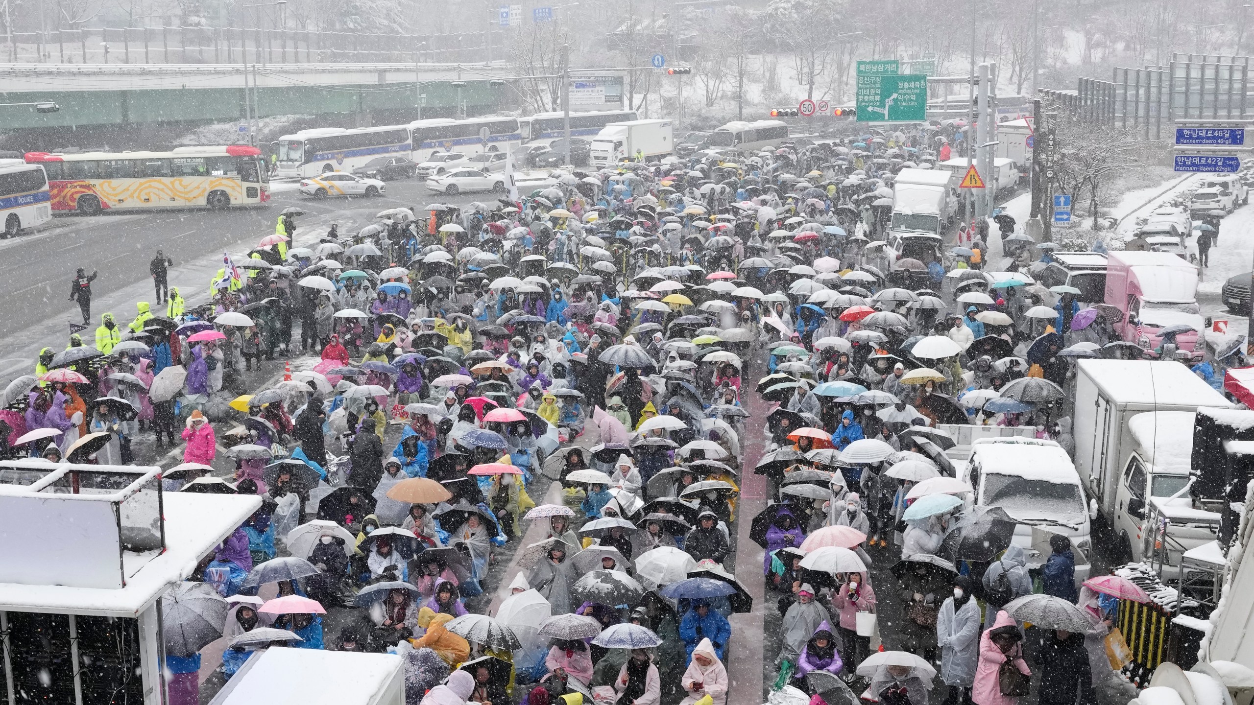 Supporters of impeached South Korean President Yoon Suk Yeol attend a Sunday service as they gather to oppose his impeachment near the presidential residence in Seoul, South Korea, Sunday, Jan. 5, 2025. (AP Photo/Ahn Young-joon)