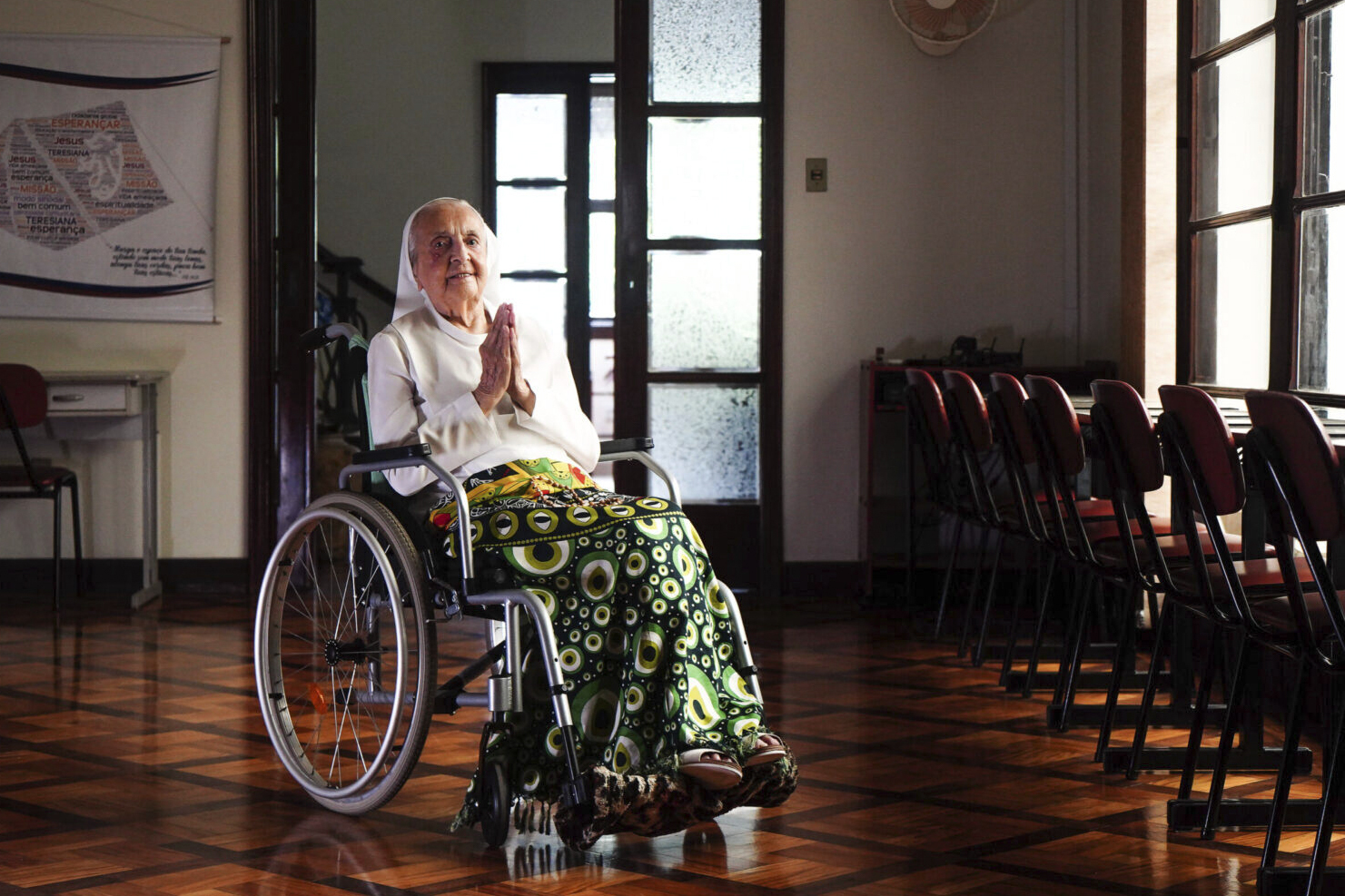 In this photo released by LongeviQuest, Sister Inah Canabarro, 115, puts her hands together in prayer, in Porto Alegre, Brazil, Friday, February 16, 2024. (Carlos Macedo/LongeviQuest, via AP)