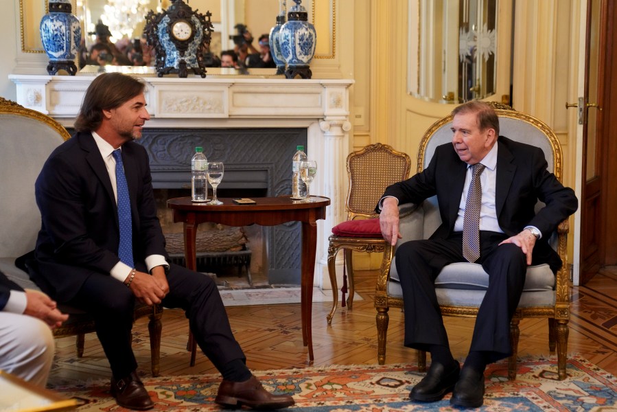 Venezuela's opposition leader Edmundo Gonzalez Urrutia, right, and Uruguayan President Luis Lacalle Pou meet in Montevideo, Uruguay, Saturday, Jan. 4, 2025. Gonzalez, who claims he won the 2024 presidential election and is recognized by some countries as the legitimate president-elect, traveled from exile in Madrid to Argentina and Uruguay. (AP Photo/Matilde Campodonico)