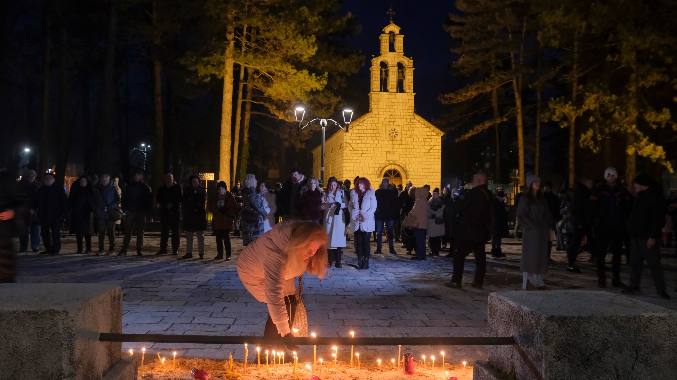 Several thousand people participated in a protest demanding the resignations of top security officials over a shooting earlier this week in Cetinje outside of Podogrica, Montenegro, Sunday, Jan. 5, 2025. (AP Photo/Risto Bozovic)