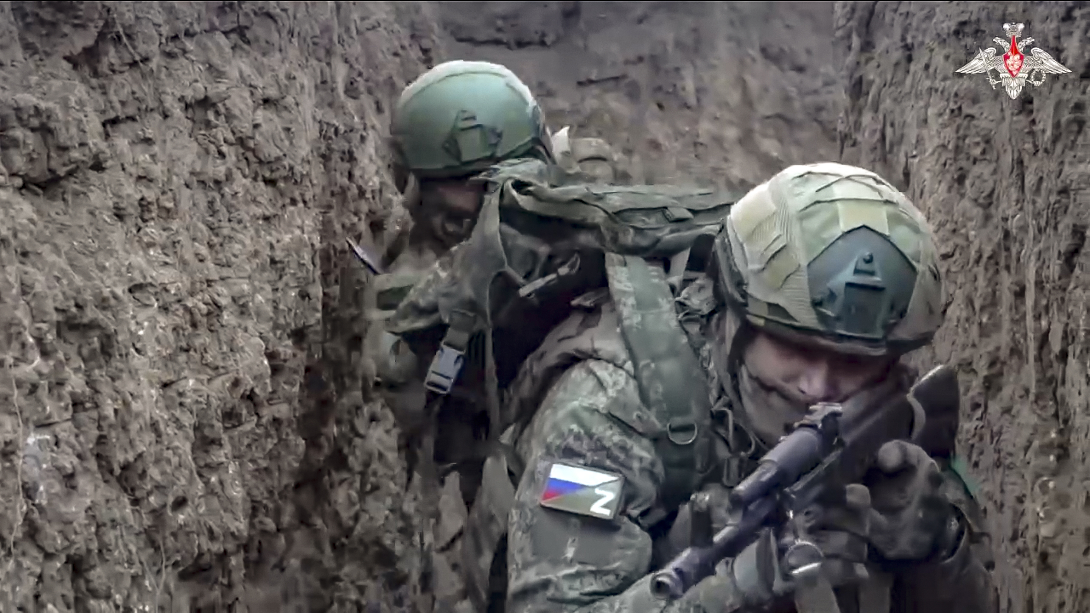 In this photo taken from video distributed by Russian Defense Ministry Press Service on Saturday, Jan. 4, 2025, Russian servicemen attend a combat training for assault units in an undisclosed location. (Russian Defense Ministry Press Service via AP)