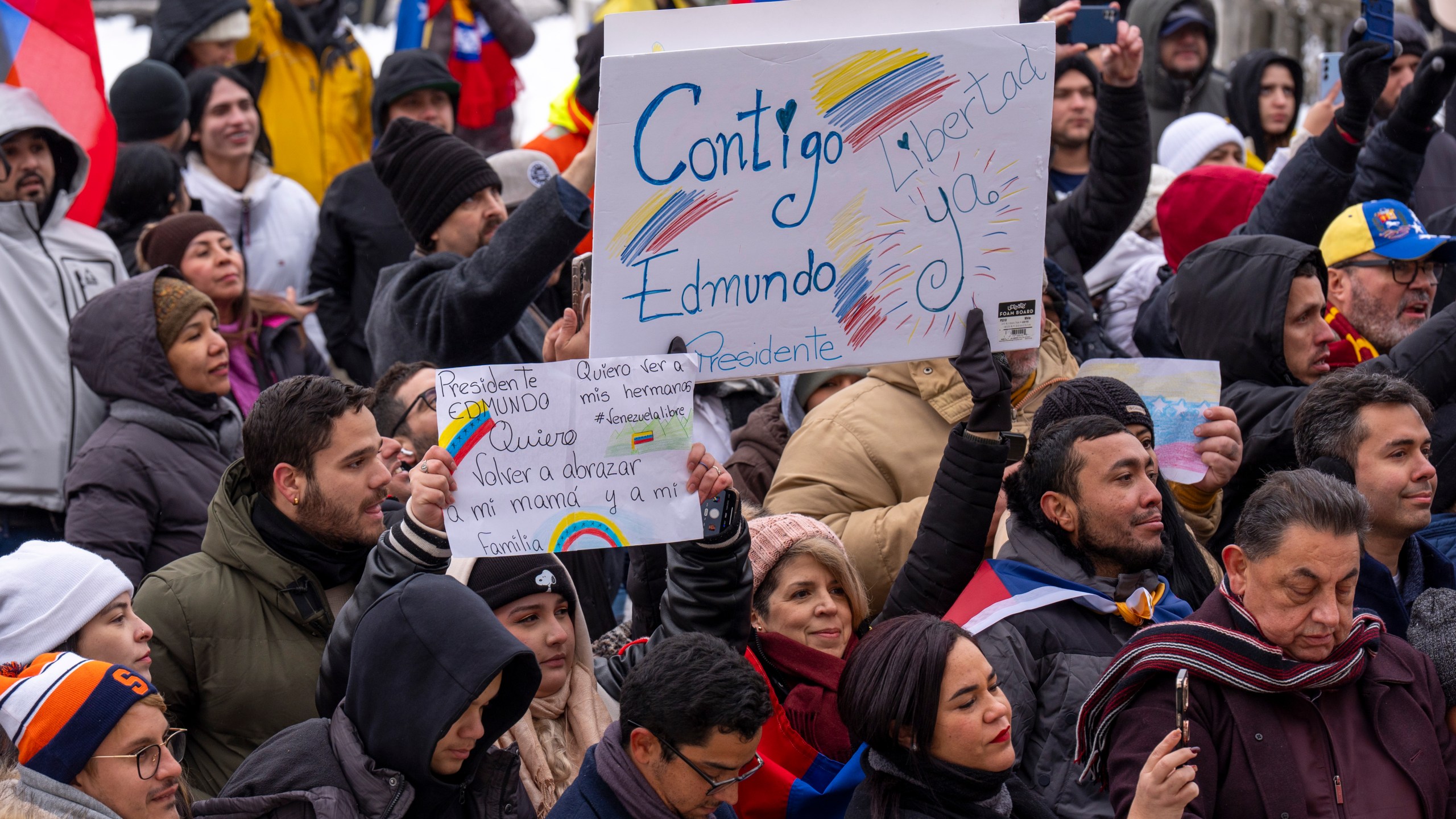 Supporters of Venezuelan opposition leader Edmundo Gonzalez hold signs calling him "President," outside of the Organization of American States, Monday, Jan. 6, 2025, in Washington. (AP Photo/Jacquelyn Martin)