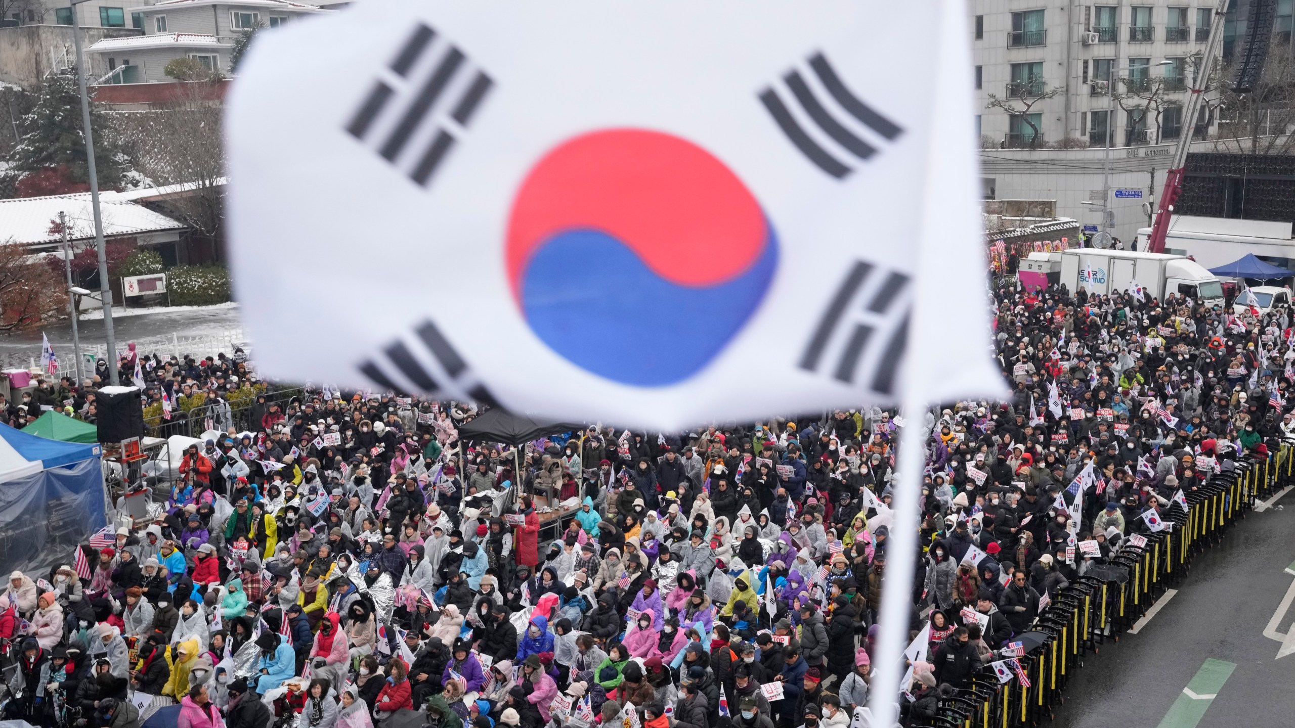 Supporters of impeached South Korean President Yoon Suk Yeol stage a rally to oppose his impeachment near the presidential residence in Seoul, South Korea, Sunday, Jan. 5, 2025. (AP Photo/Ahn Young-joon)