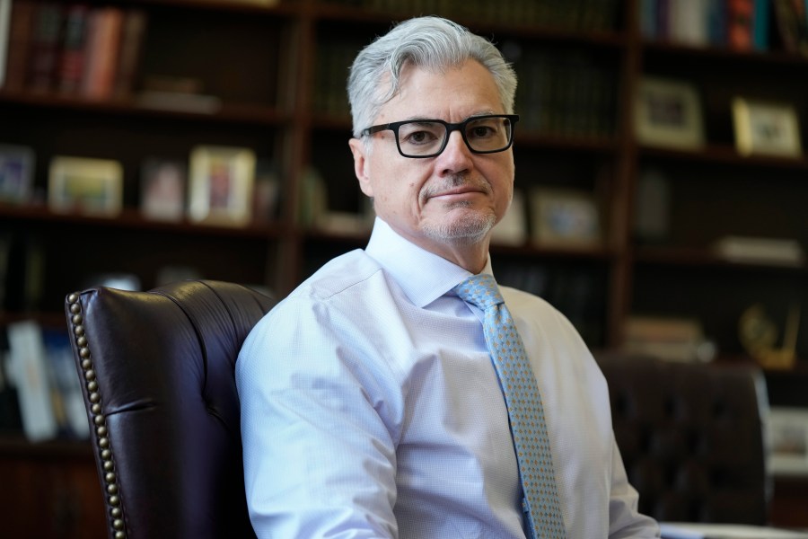 FILE - Judge Juan M. Merchan sits for a portrait in his chambers in New York, March 14, 2024. (AP Photo/Seth Wenig, File)