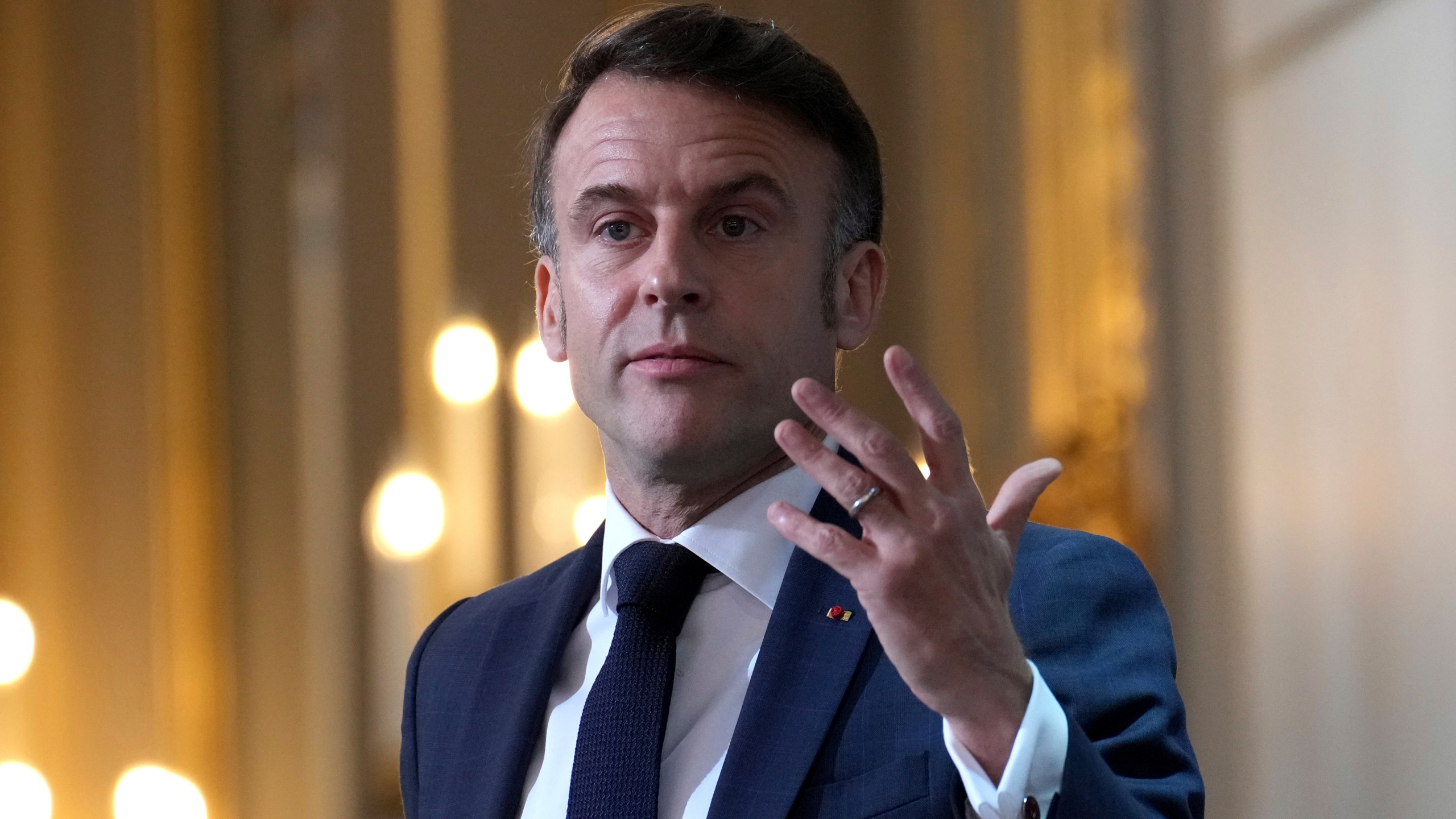 French President Emmanuel Macron delivers his speech to French ambassadors posted around the world, Monday, Jan. 6, 2025 at the Elysee Palace in Paris. (AP Photo/Aurelien Morissard, Pool)