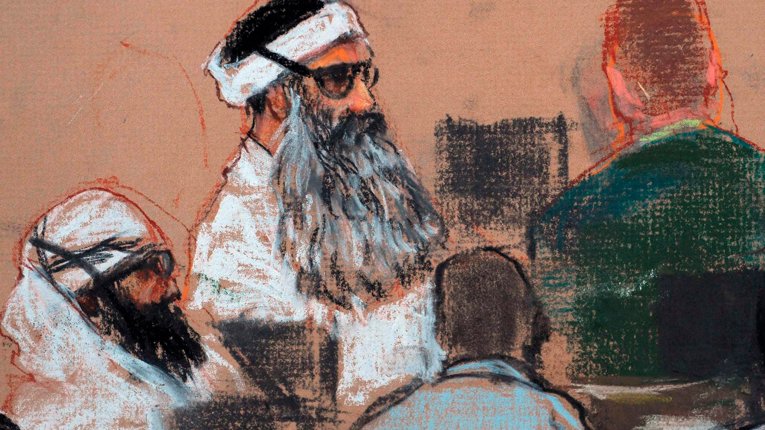 FILE - This Monday, Dec. 8, 2008 courtroom drawing by artist Janet Hamlin and reviewed by the U.S. military, shows Khalid Sheikh Mohammed, center, and co-defendant Walid Bin Attash, left, attending a pre-trial session at Guantanamo Bay Naval Base, Cuba. (AP Photo/Janet Hamlin, Pool, File)