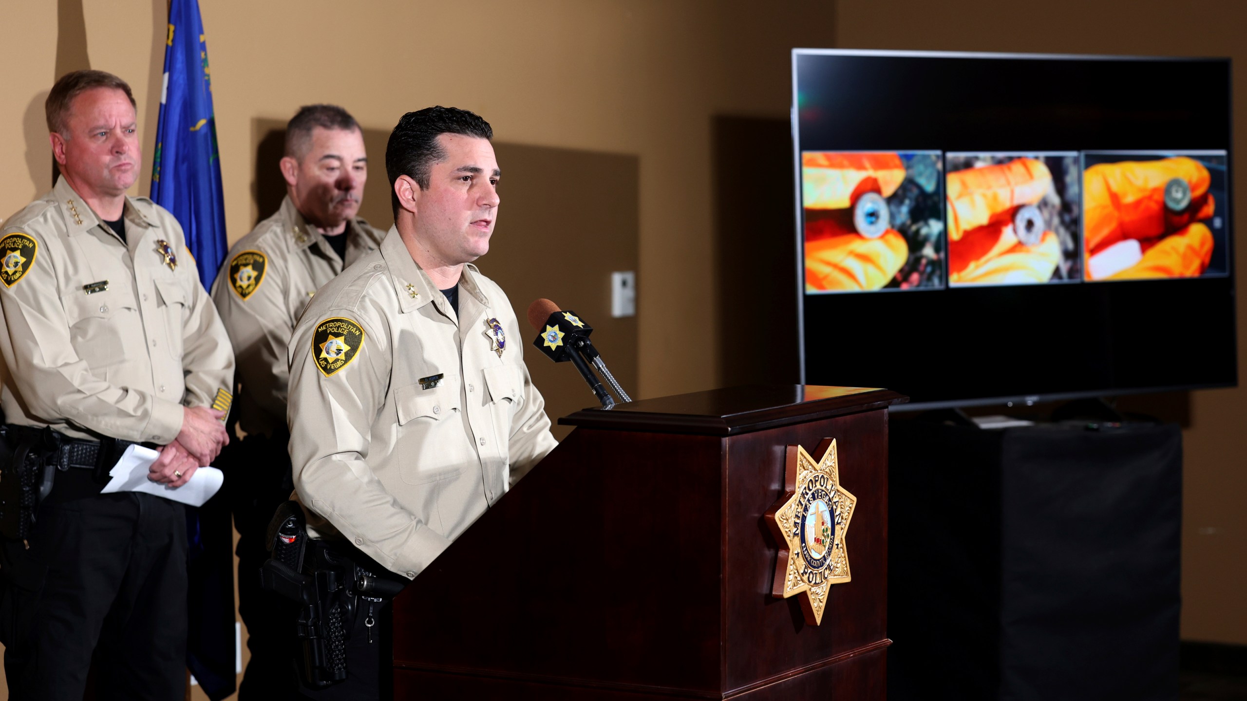 Metropolitan Police Department Assistant Sheriff Dori Koren shows a photo of bullet casings found in a Tesla Cybertruck that exploded at the Trump International Hotel on New Year's Day, during a news conference at the department headquarters in Las Vegas, Tuesday, Jan. 7, 2025, (K.M. Cannon/Las Vegas Review-Journal via AP)