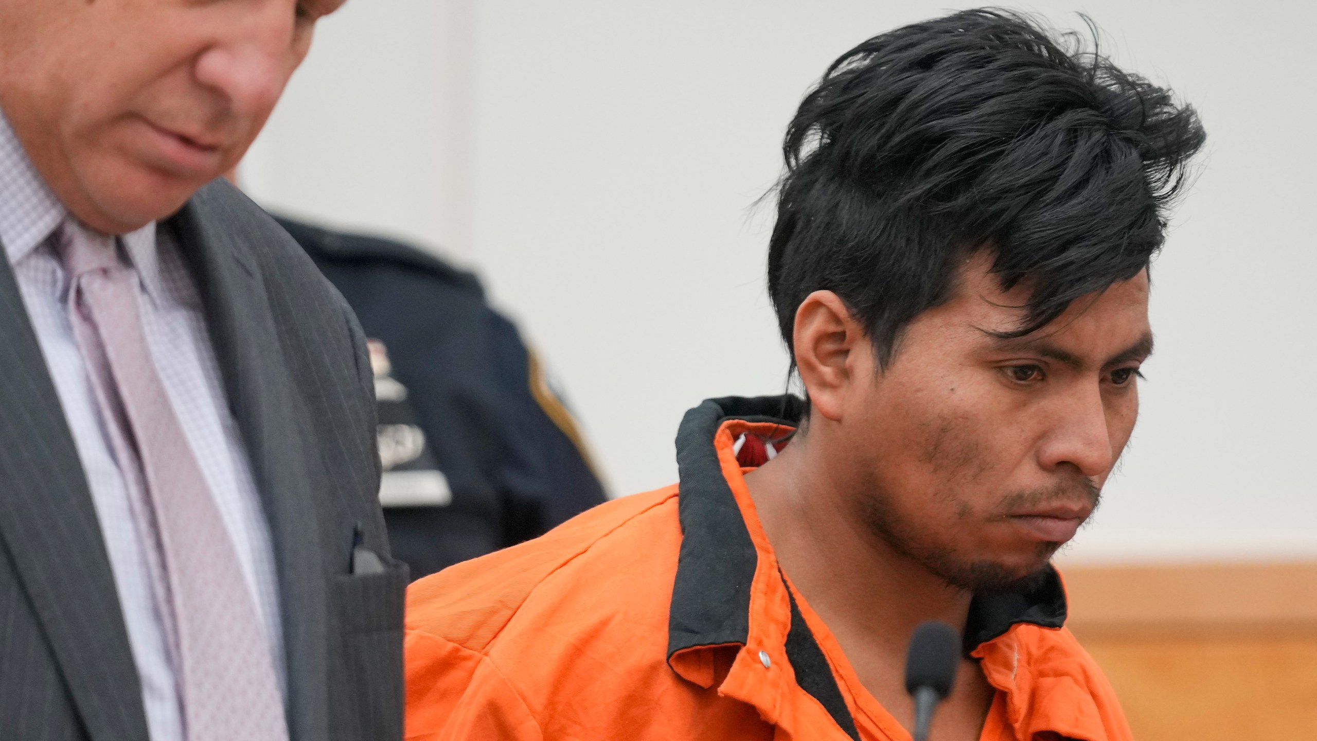 Sebastian Zapeta, right, accused of burning a woman to death inside a New York City subway train, appears in Kings County Supreme Court for an arraignment, Tuesday, Jan. 7, 2025, in New York. (AP Photo/Seth Wenig)