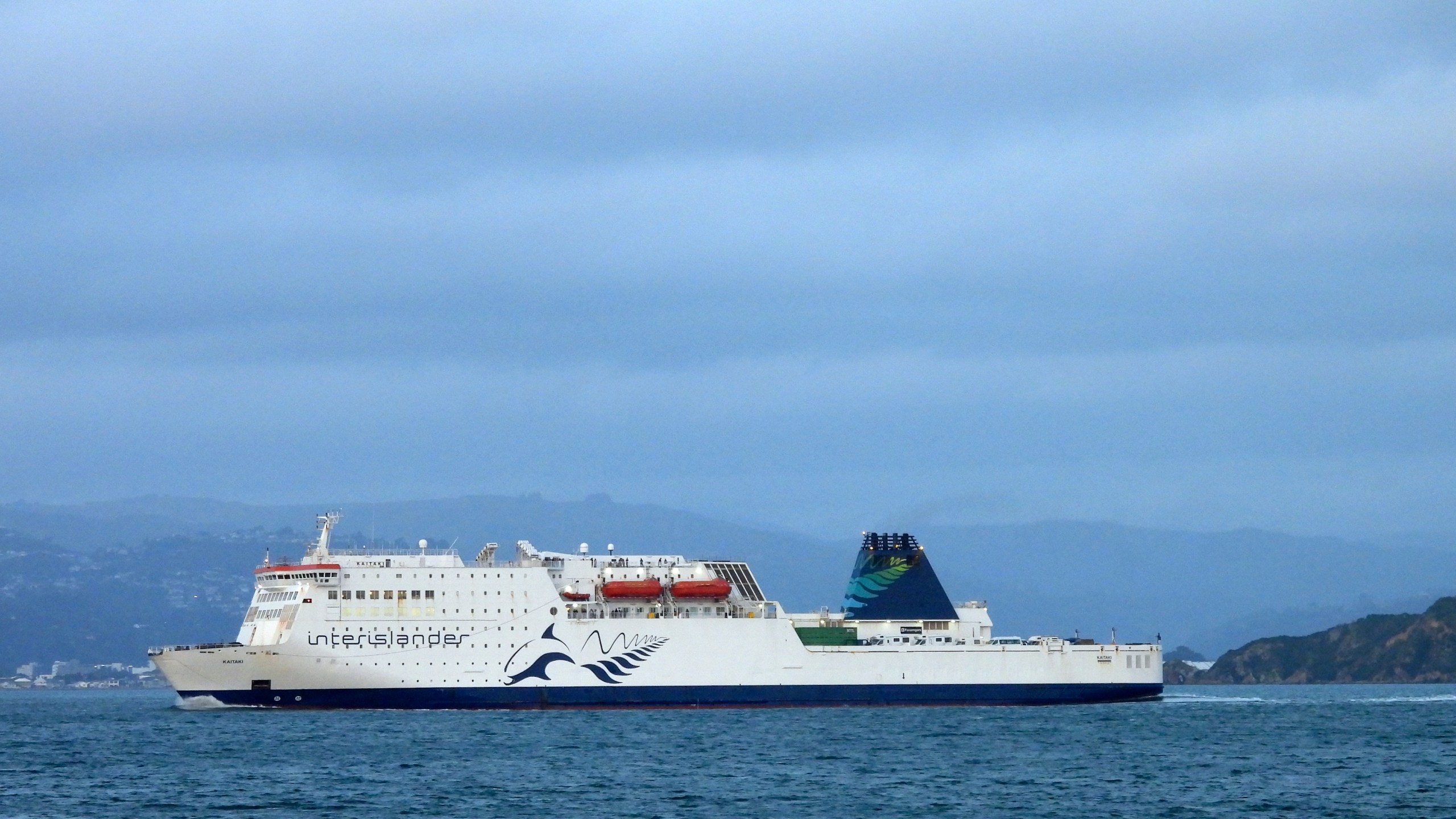 An Interislander ferry arrives in Wellington harbor, New Zealand, on Tuesday, Jan. 7, 2025. (AP Photo/Charlotte Graham-McLay)