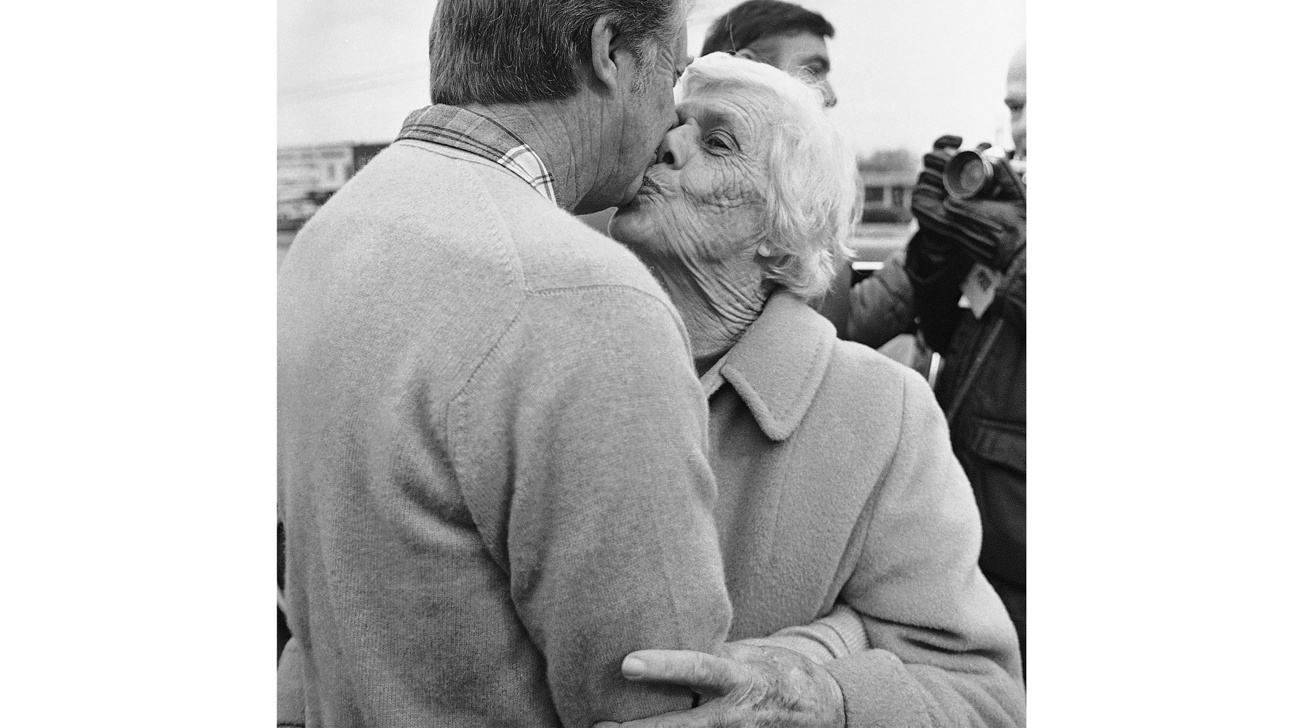 FILE - President-elect Jimmy Carter gets a kiss from his mother, Lillian Carter, on Dec. 6, 1976, in Plains, Ga. (AP Photo/File)