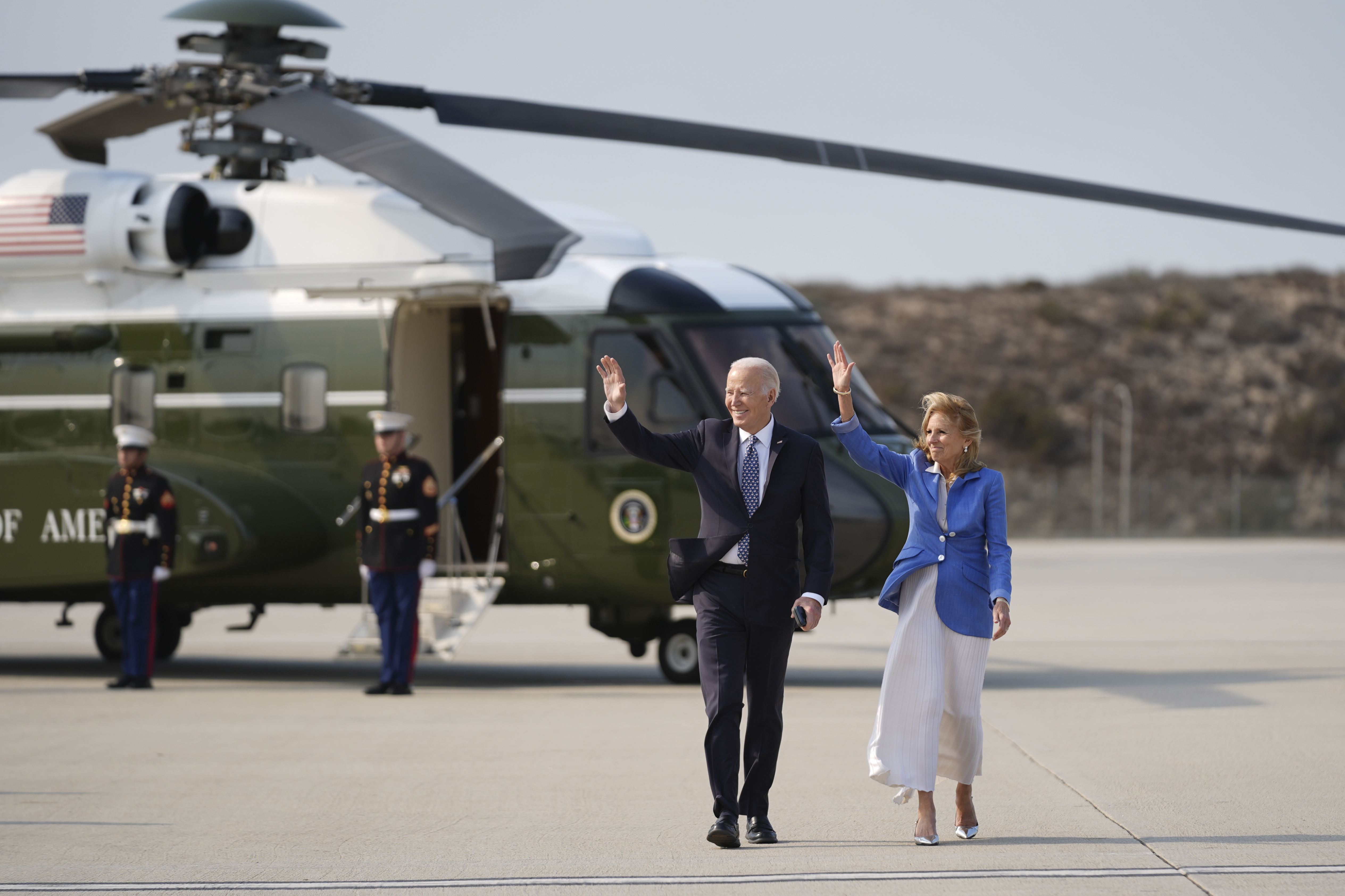 President Joe Biden and first lady Jill Biden, wave as they walk to board Air Force One at Los Angeles International Airport in Los Angeles, Wednesday, Jan. 8, 2025, en route to Washington. (AP Photo/Stephanie Scarbrough)