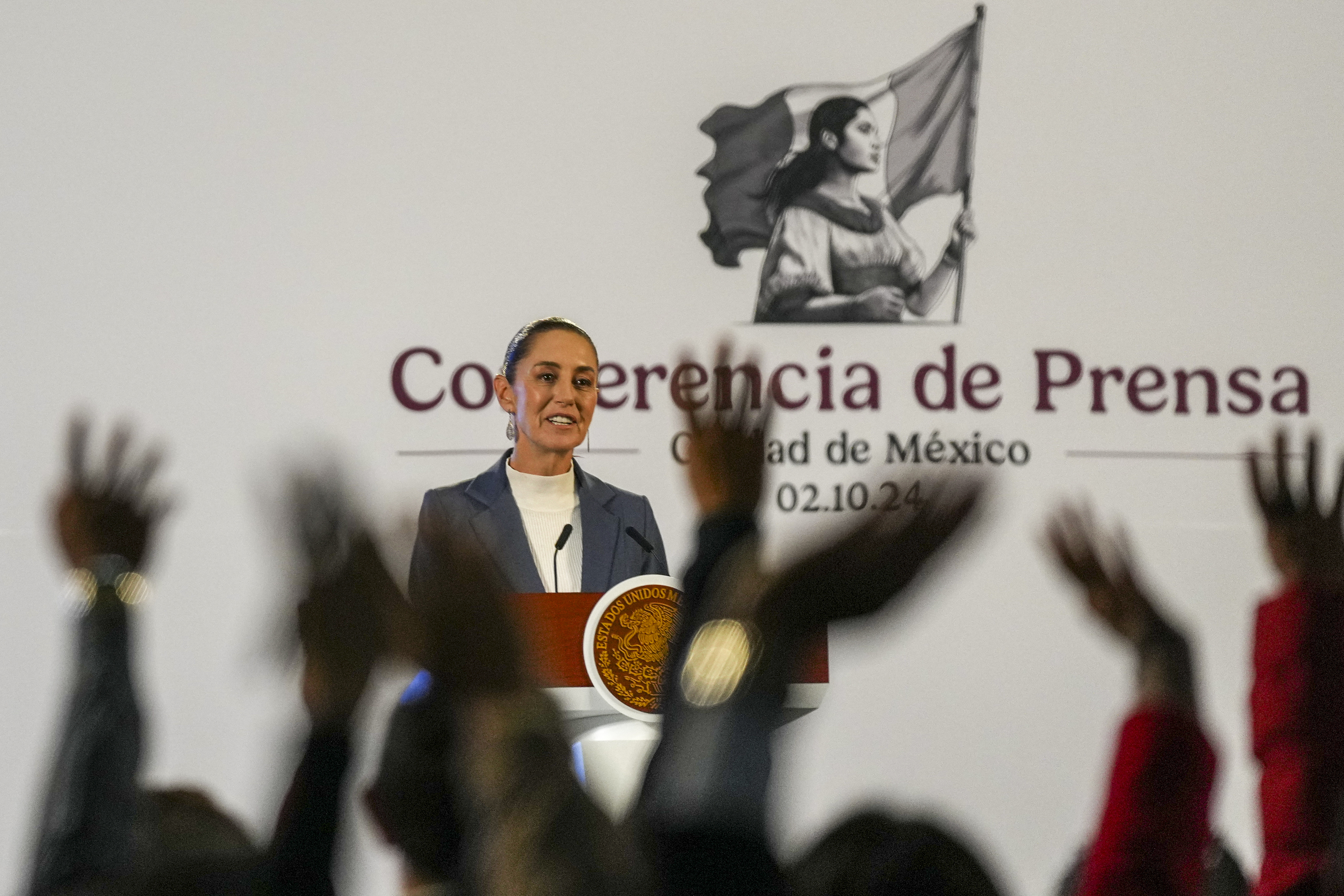 FILE - Mexican President Claudia Sheinbaum gives a media briefing at the National Palace in Mexico City, Oct. 2, 2024. (AP Photo/Fernando Llano, File)