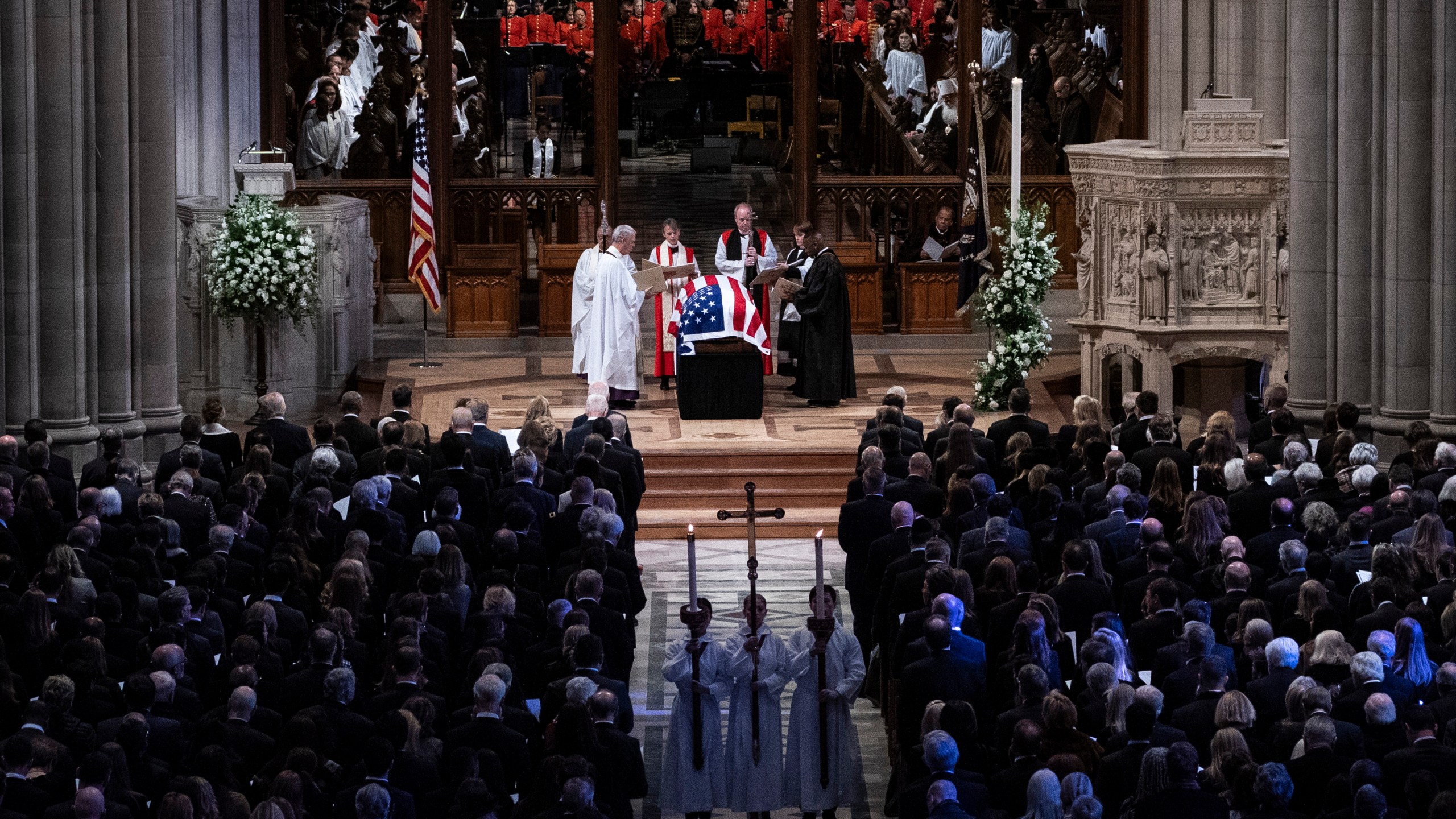 The flag-draped casket of former President Jimmy Carter is pictured before being carried out following a state funeral at the National Cathedral, Thursday, Jan. 9, 2025, in Washington. (Haiyun Jiang/The New York Times via AP, Pool)