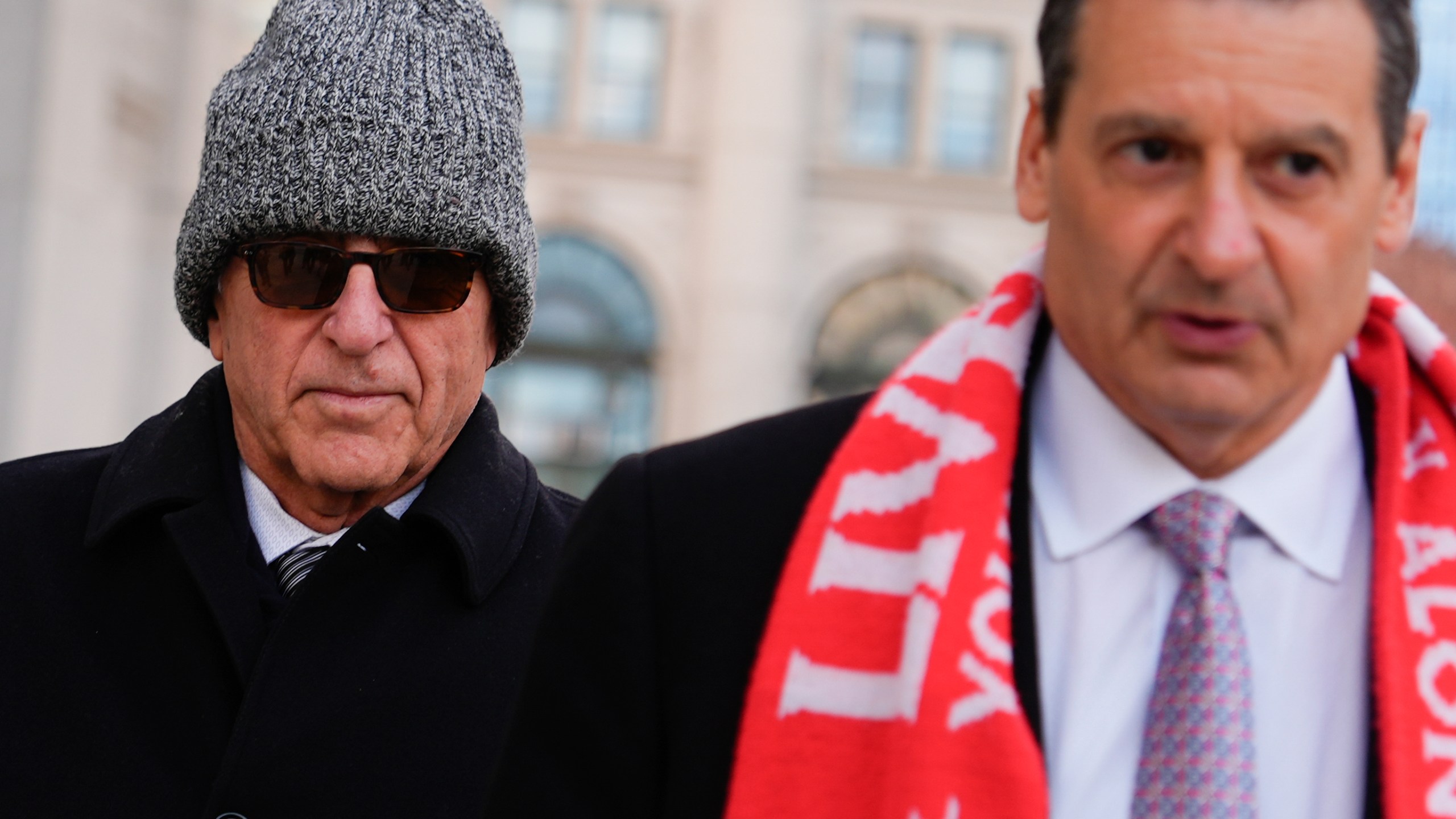 Erden Arkan, left, leaves federal court, Friday, Jan. 10, 2025, in New York, after pleading guilty to a charge alleging that he worked with a Turkish government official to funnel illegal campaign contributions to New York City Mayor Eric Adams. (AP Photo/Julia Demaree Nikhinson)