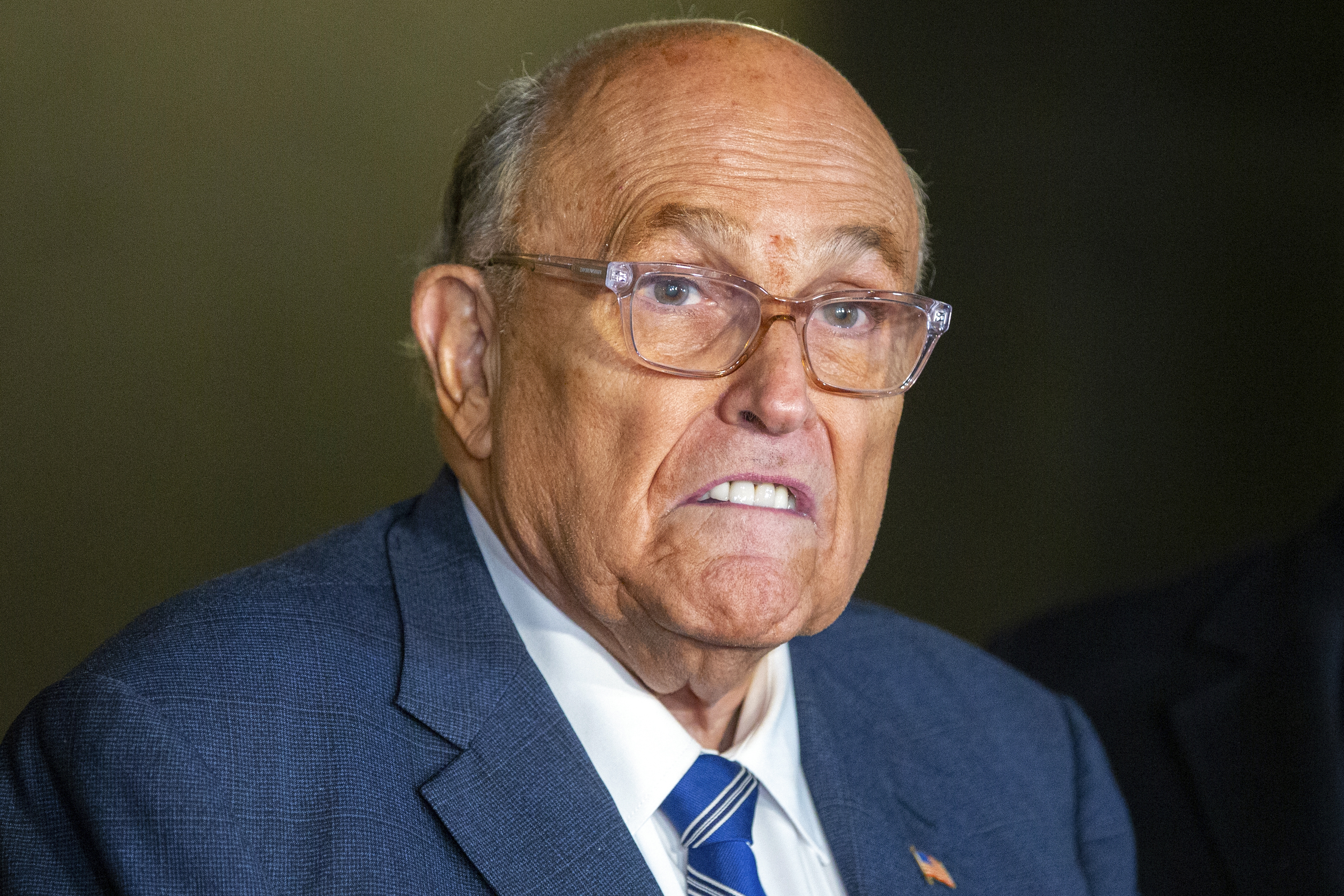 FILE - Rudy Giuliani speaks to the media outside Manhattan federal court in New York after testifying in a contempt hearing, Jan. 3, 2025. (AP Photo/Ted Shaffrey, File)