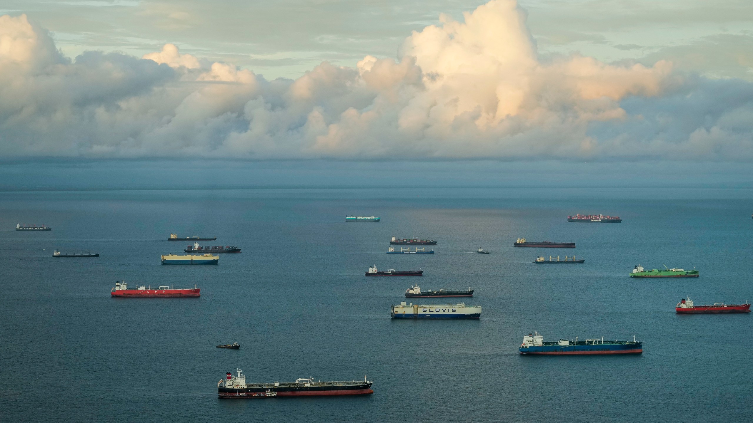 FILE - Cargo ships wait to transit the Panama Canal in Panama City, on June 28, 2024. (AP Photo/Matias Delacroix, File)