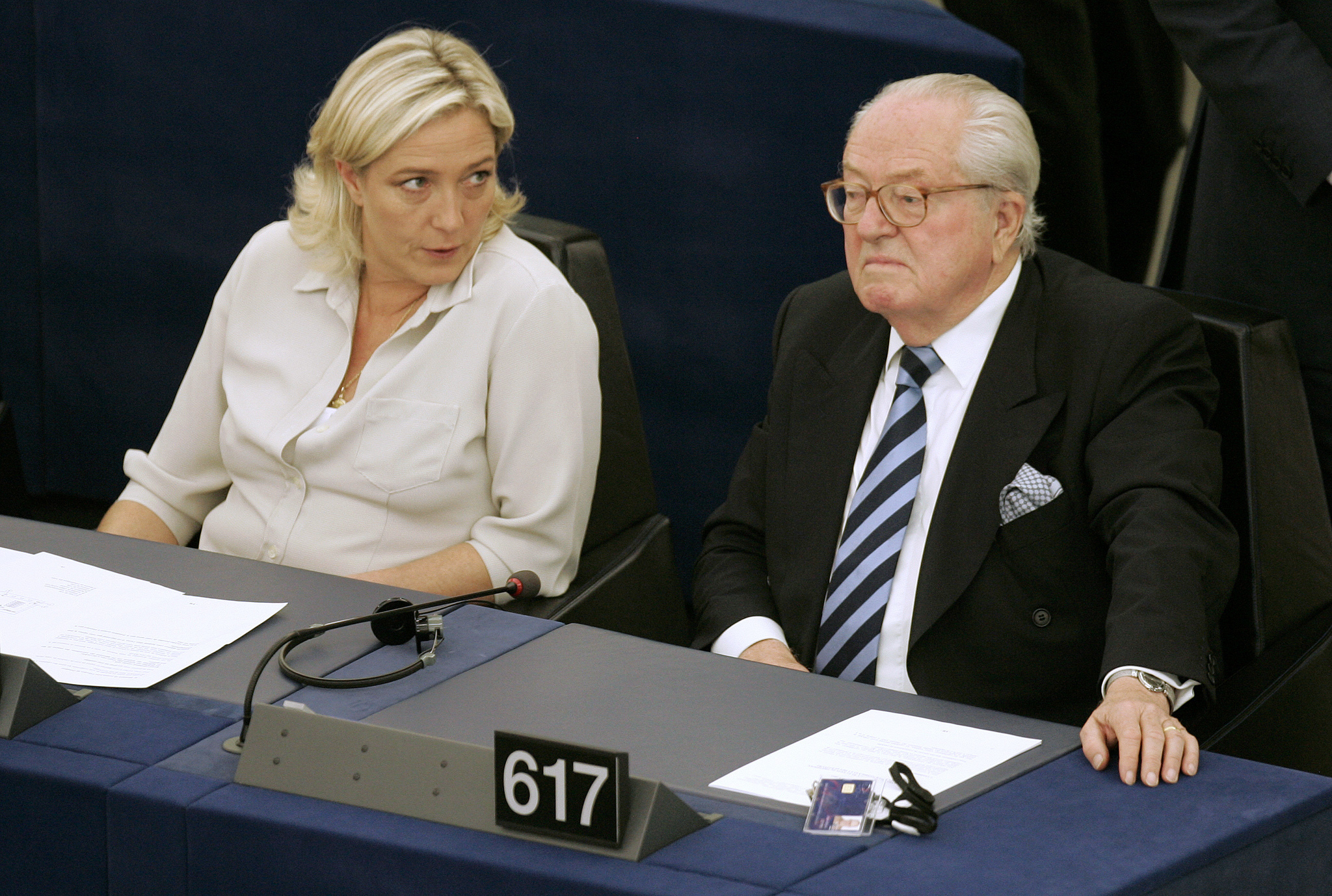 FILE - Jean-Marie Le Pen, right, and his daughter Marine Le Pen sit at the European Parliament, in Strasbourg, eastern France, July 14, 2009. (AP Photo/Lionel Cironneau, File)