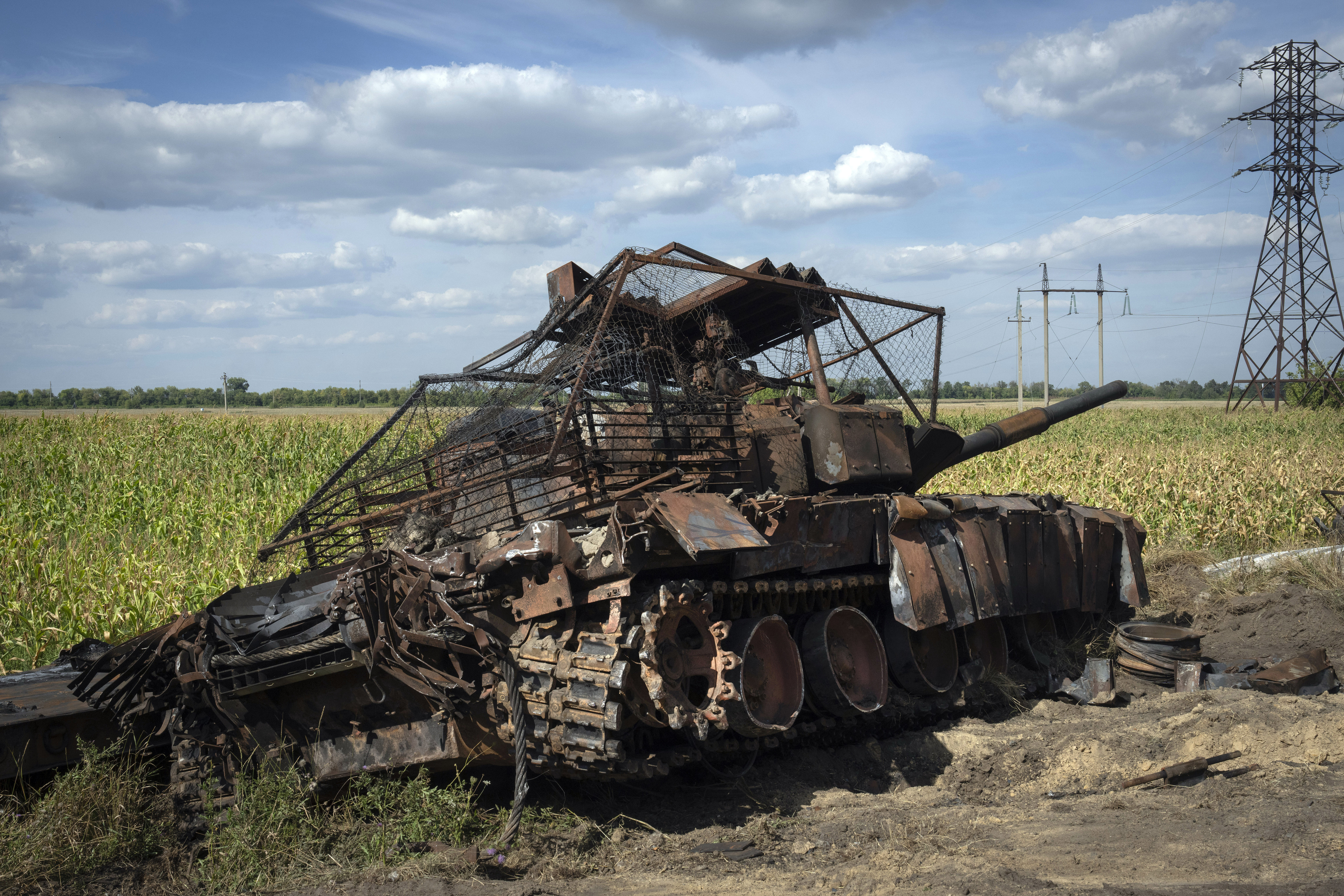 FILE - A destroyed Russian tank sits on a roadside near the town of Sudzha, Russia, in the Kursk region, on Aug. 16, 2024, in an image approved by the Ukrainian Defense Ministry. (AP Photo, File)