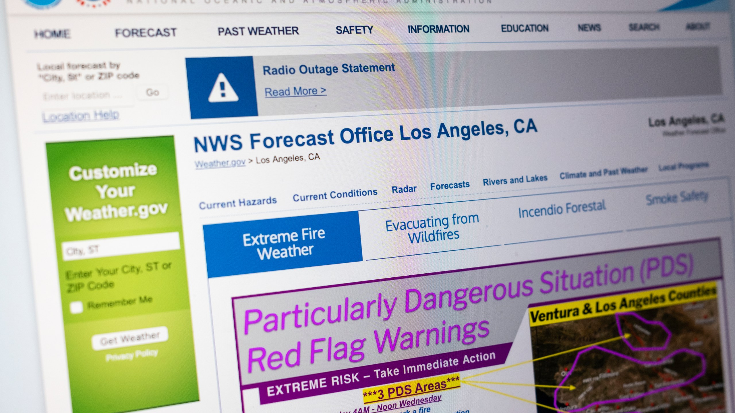 A "Particularly Dangerous Situation" red flag warning appears on the National Weather Service's website for Los Angeles due to the extreme risk of wildfires in the region, Monday, Jan. 13, 2025. (AP Photo/Rachel Leathe)