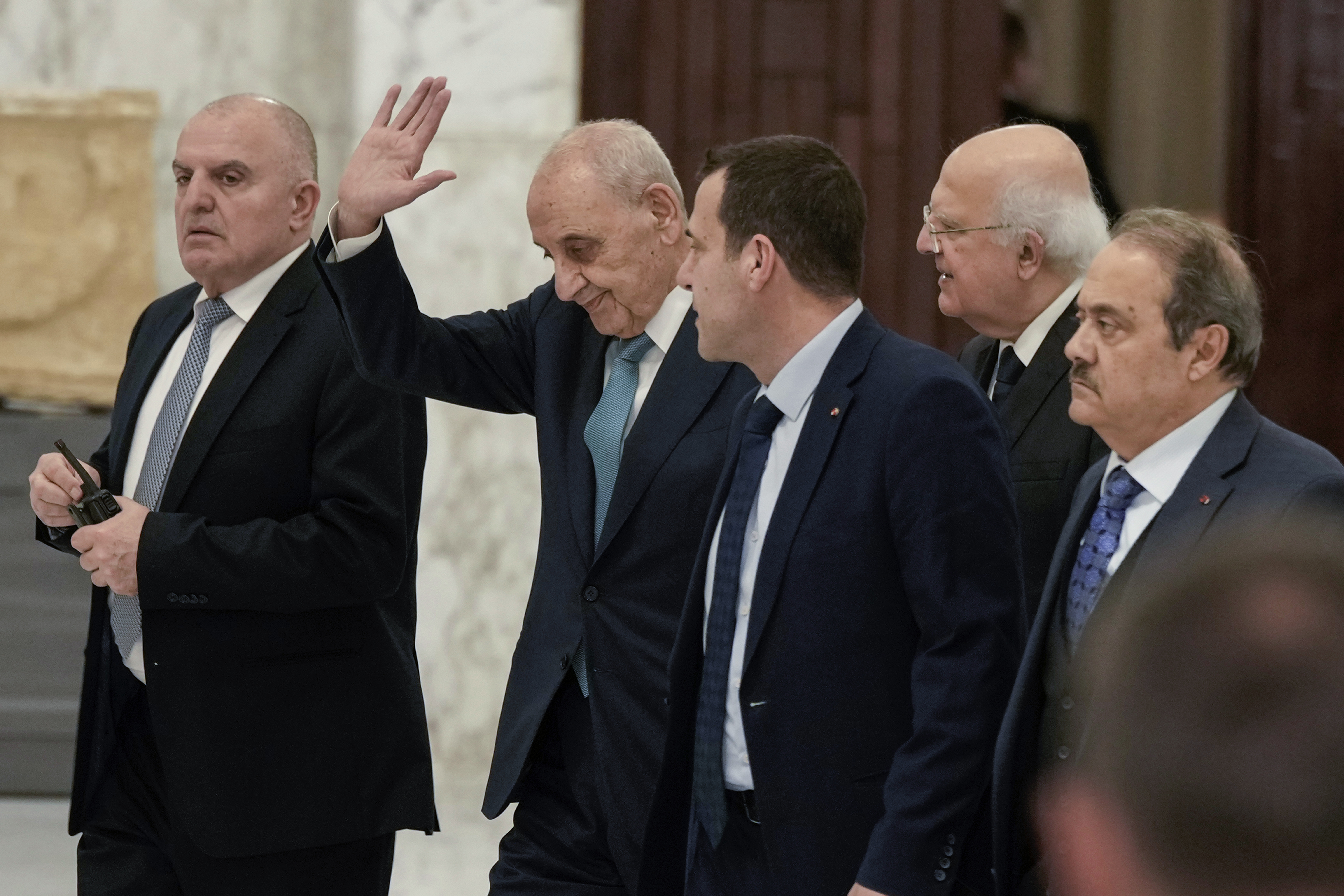 Parliament Speaker Nabih Berri, second left, waves to journalists after his meeting with Lebanese President Joseph Aoun at the presidential palace in Baabda, east of Beirut, Lebanon, Monday, Jan. 13, 2025. (AP Photo/Bilal Hussein)