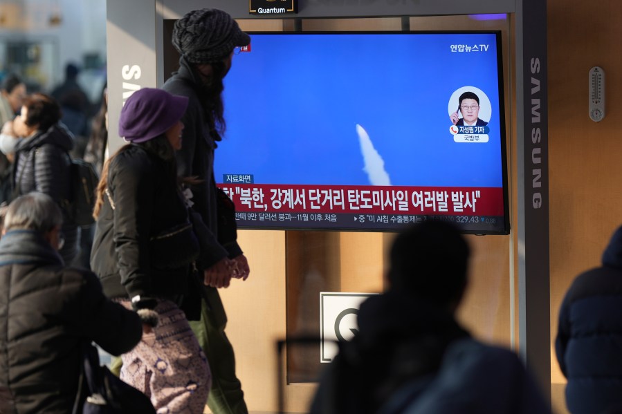 A TV screen shows a report of North Korea's missiles launch with file footage during a news program at the Seoul Railway Station in Seoul, South Korea, Tuesday, Jan. 14, 2025. (AP Photo/Lee Jin-man)