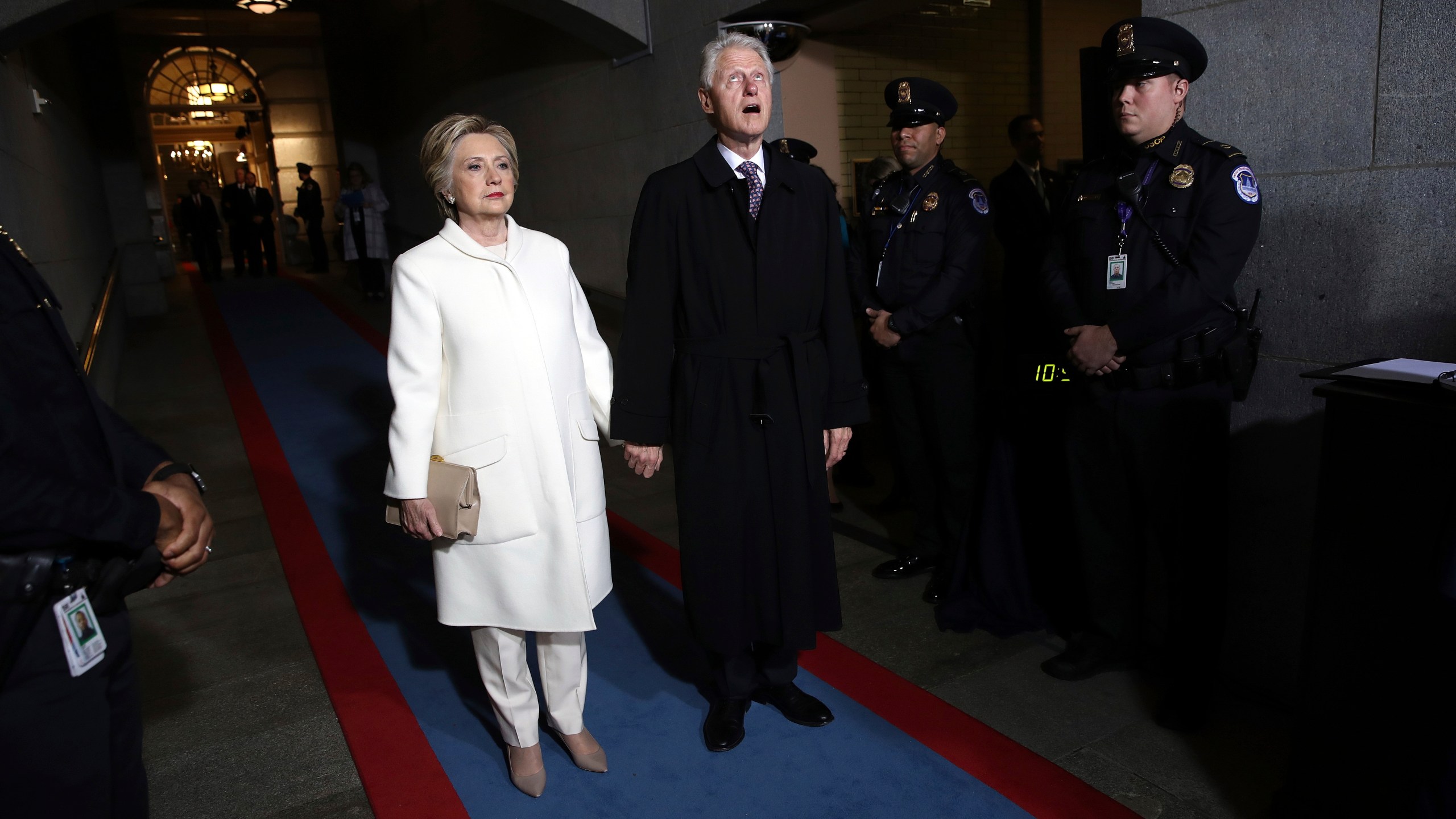 FILE - Former Sen. Hillary Clinton and former President Bill Clinton arrive on the West Front of the U.S. Capitol, in Washington, Jan. 20, 2017, for the inauguration ceremony of Donald J. Trump as the 45th president of the United States. (Win McNamee/AP Photo File)