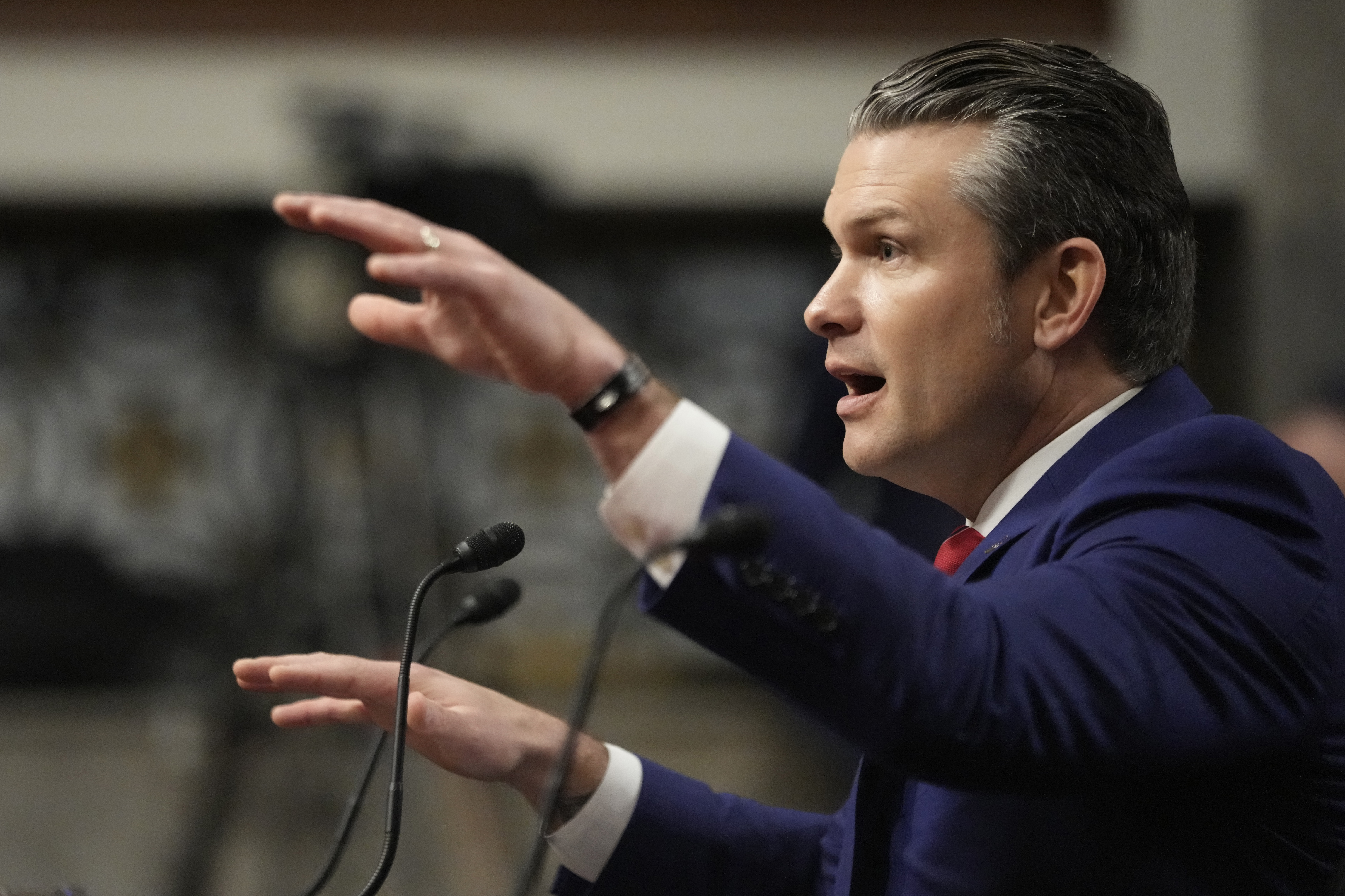 Pete Hegseth, President-elect Donald Trump's choice to be Defense secretary, speaks before the Senate Armed Services Committee for his confirmation hearing, at the Capitol in Washington, Tuesday, Jan. 14, 2025. (AP Photo/Ben Curtis)