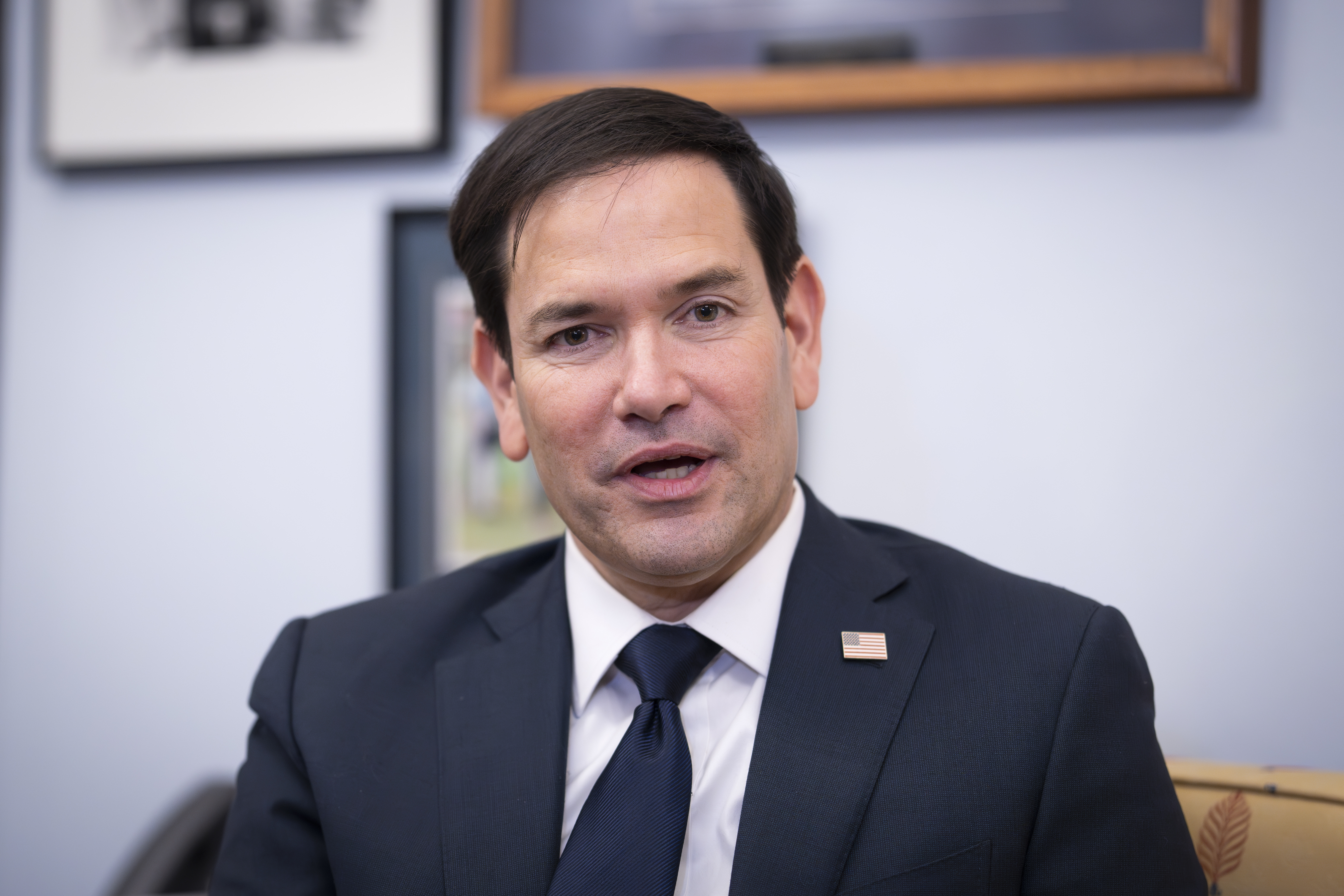 FILE - Sen. Marco Rubio, R-Fla., President-elect Trump's nominee to be secretary of State, speaks as he meets with Sen. Lindsey Graham, R-S.C., at the Capitol in Washington, Dec. 3, 2024. (AP Photo/J. Scott Applewhite, File)