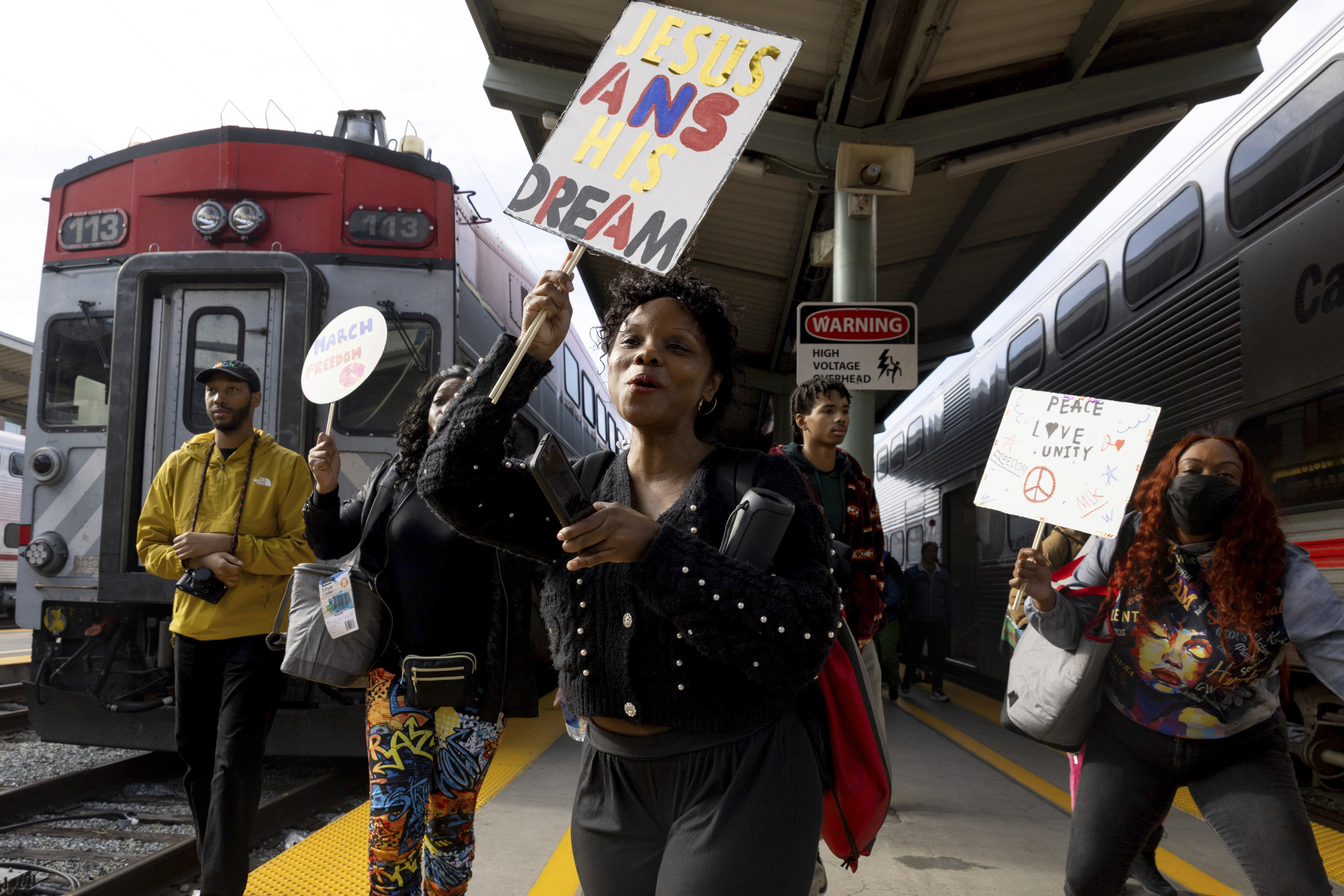 FILE - Passengers depart the Caltrain Norcal MLK Celebration Train in San Francisco on Martin Luther King Jr. Day on Monday, Jan. 15, 2024. (Benjamin Fanjoy/San Francisco Chronicle via AP, File)