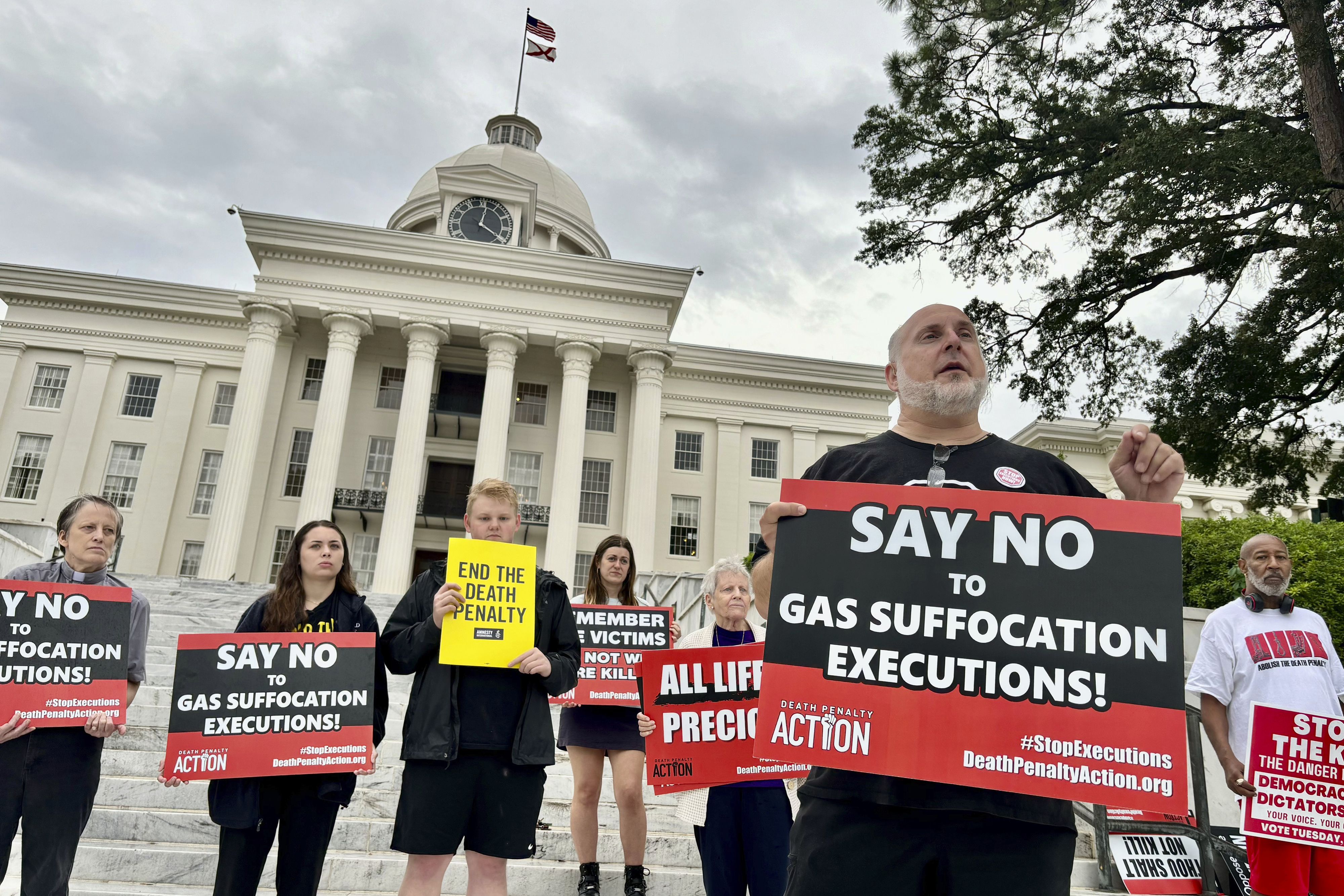 FILE - Abraham Bonowitz, executive director of Death Penalty Action, and other death penalty opponents hold a demonstration outside the Alabama Capitol in Montgomery, Ala., Sept. 25, 2024, asking the state to call off the scheduled execution of Alan Miller in what would be the nation's second execution using nitrogen gas. (AP Photo/Kim Chandler, File)