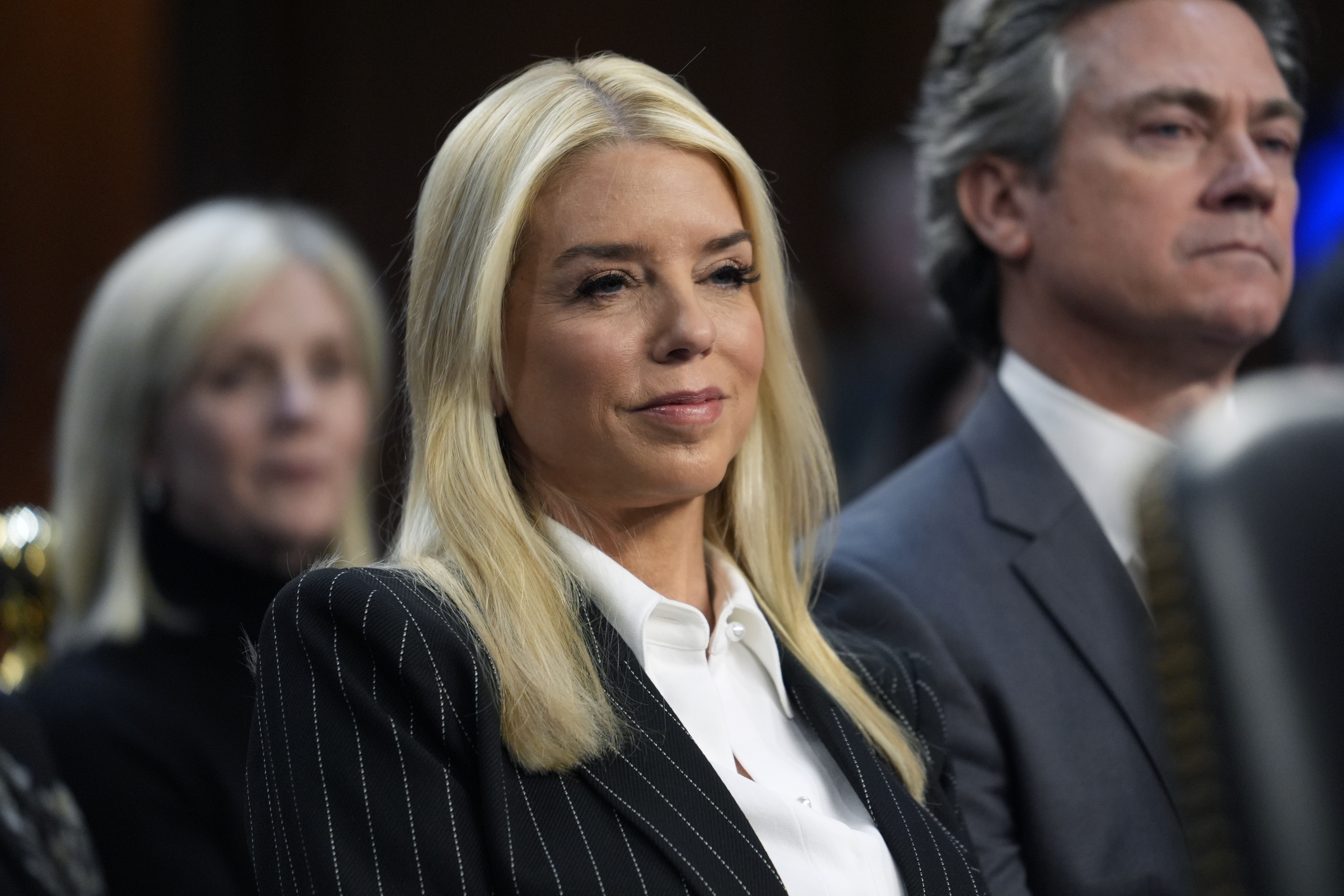 Pam Bondi, President-elect Donald Trump's choice to lead the Justice Department as attorney general, appears before the Senate Judiciary Committee for her confirmation hearing, at the Capitol in Washington, Wednesday, Jan. 15, 2025. (AP Photo/J. Scott Applewhite)