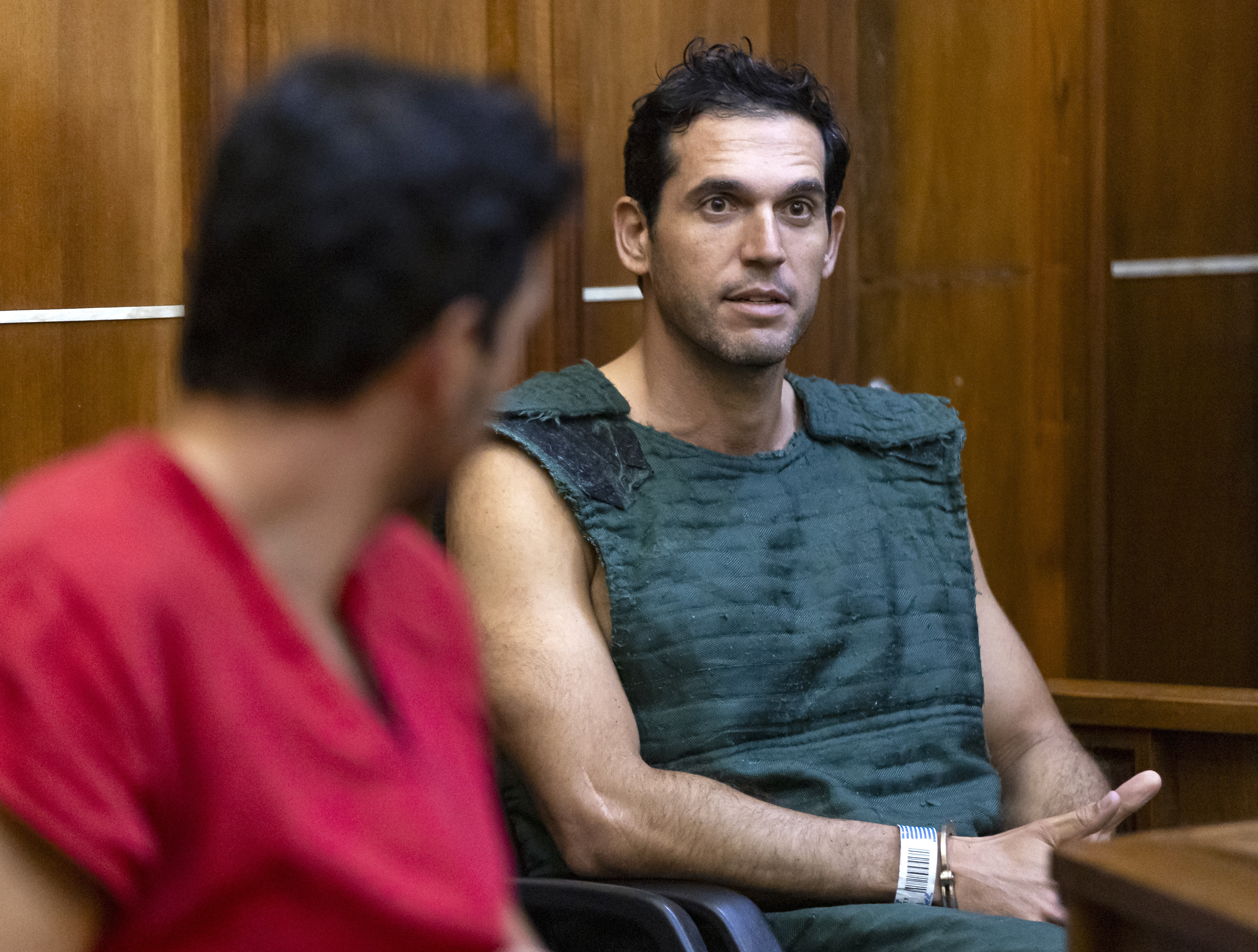 FILE - Alon Alexander, 37, right, and his twin brother, Oren, left, attend their bond hearing at the Richard E. Gerstein Justice Building after being charged with multiple state and federal crimes, including sex trafficking and rape, on Friday, Dec. 13, 2024, in Miami. (Matias J. Ocner/Miami Herald via AP, Pool)