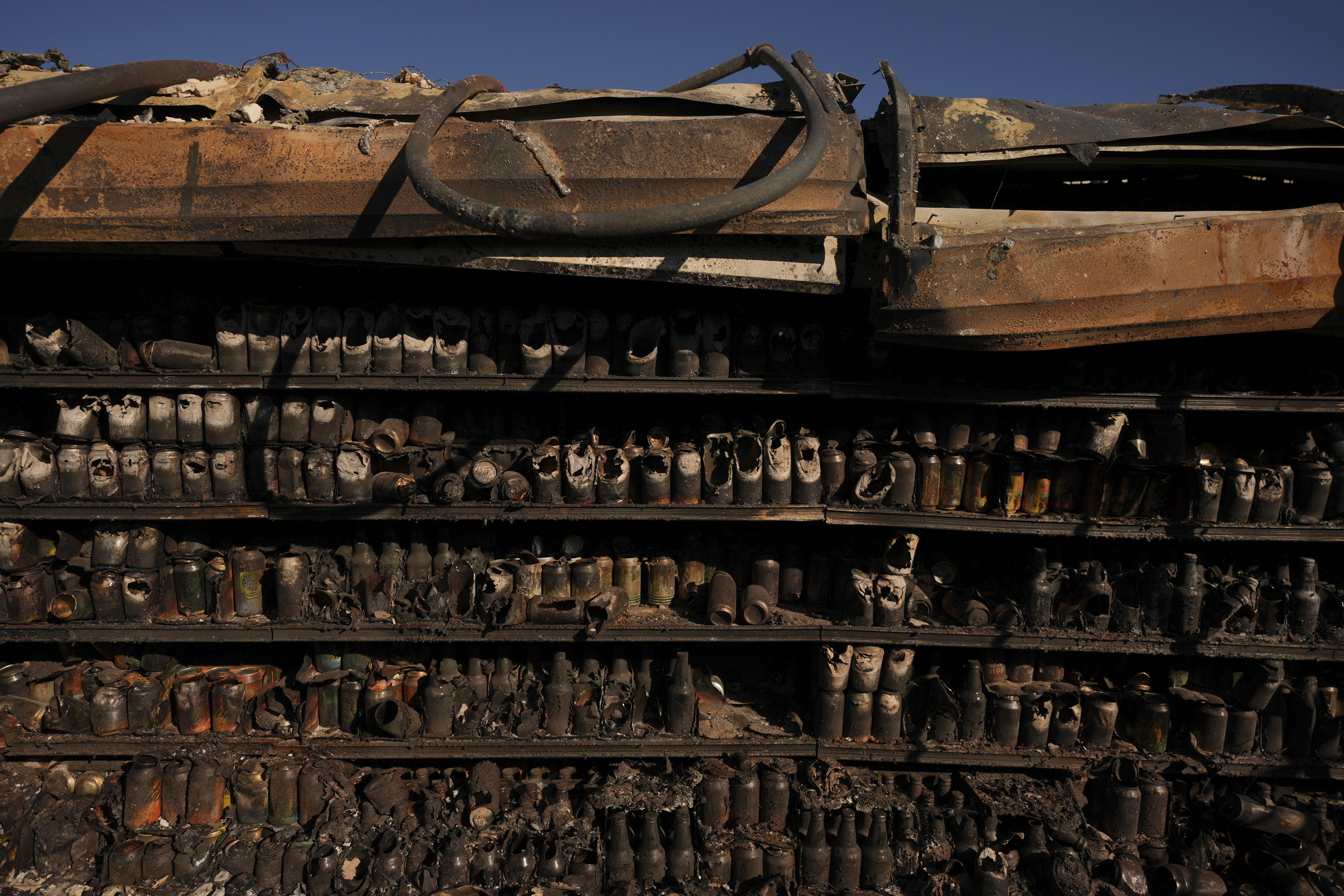 Gelson's Market destroyed by the Palisades Fire is seen in Malibu, Calif., Wednesday, Jan. 15, 2025. (AP Photo/Jae C. Hong)