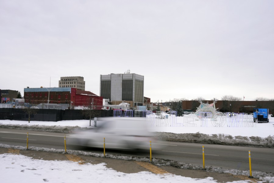 Vehicles travel along Verity Parkway through downtown, Tuesday, Jan. 14, 2025, in Middletown, Ohio. The city is the hometown of Vice President-elect JD Vance.(AP Photo/Kareem Elgazzar)