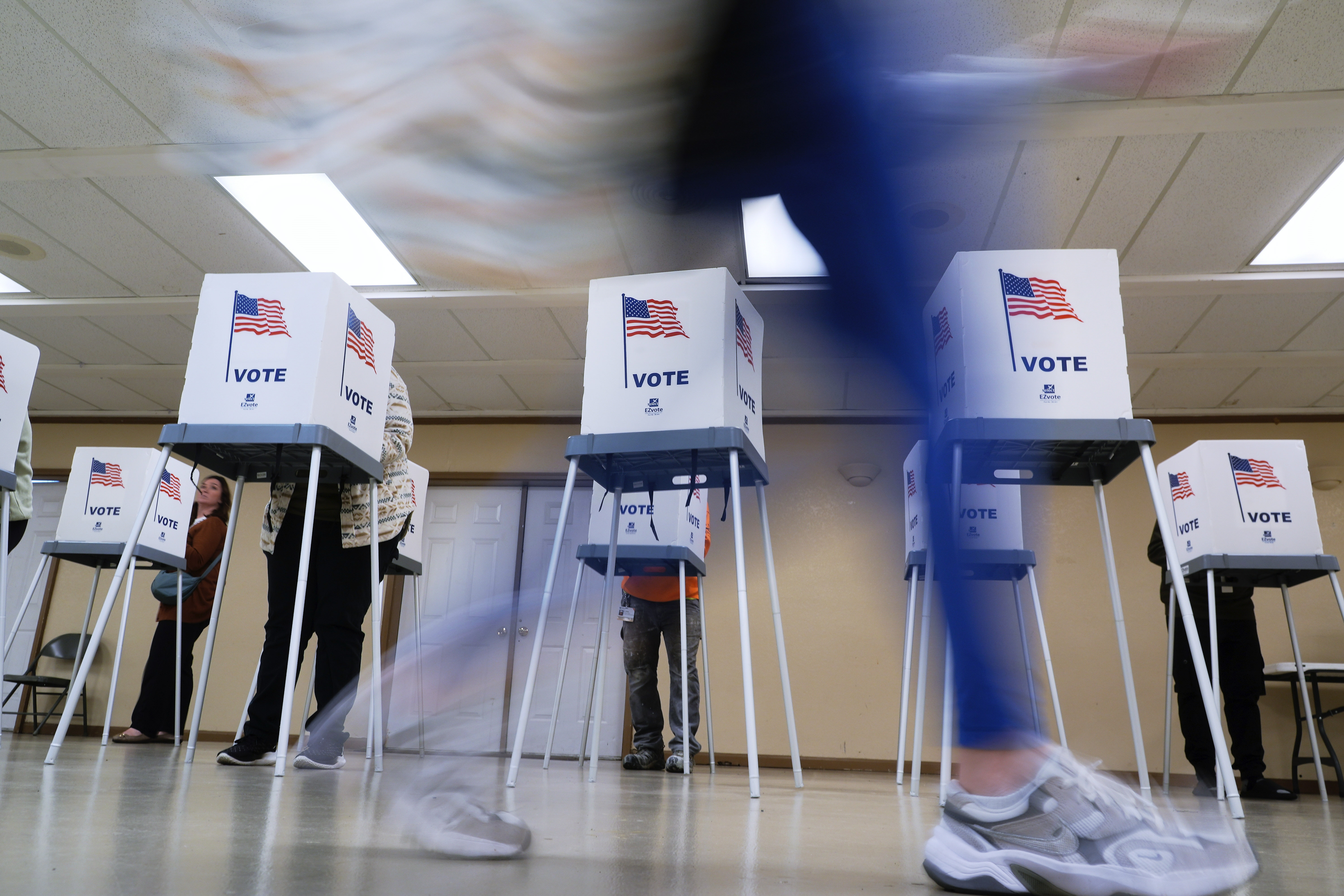 FILE - People vote, Nov. 5, 2024, in Oak Creek, Wis. (AP Photo/Morry Gash, File)