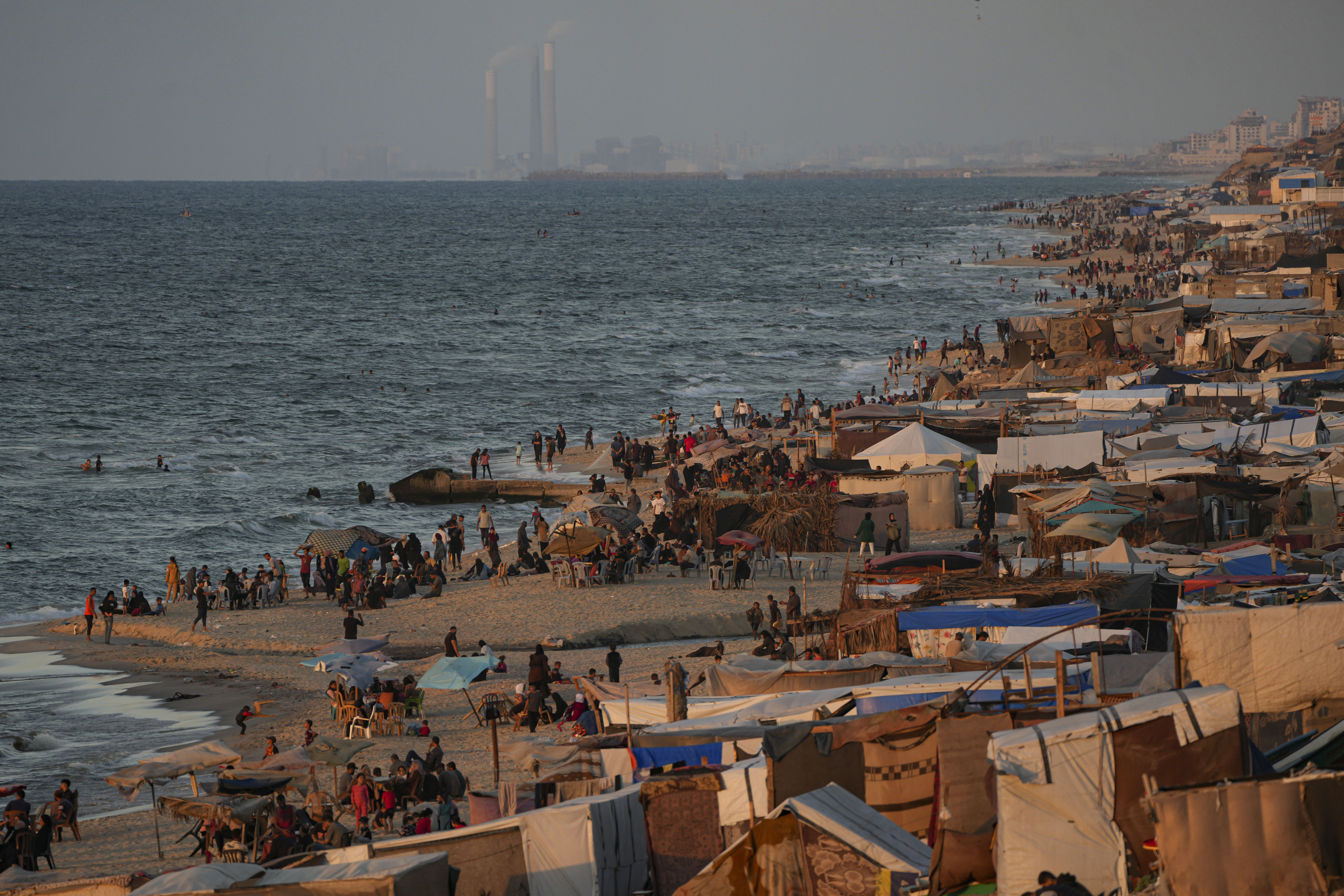 FILE - Tents are crammed together in a displaced Palestinians camp along the beach of Deir al-Balah, central Gaza Strip, on Oct. 9, 2024. (AP Photo/Abdel Kareem Hana, File)