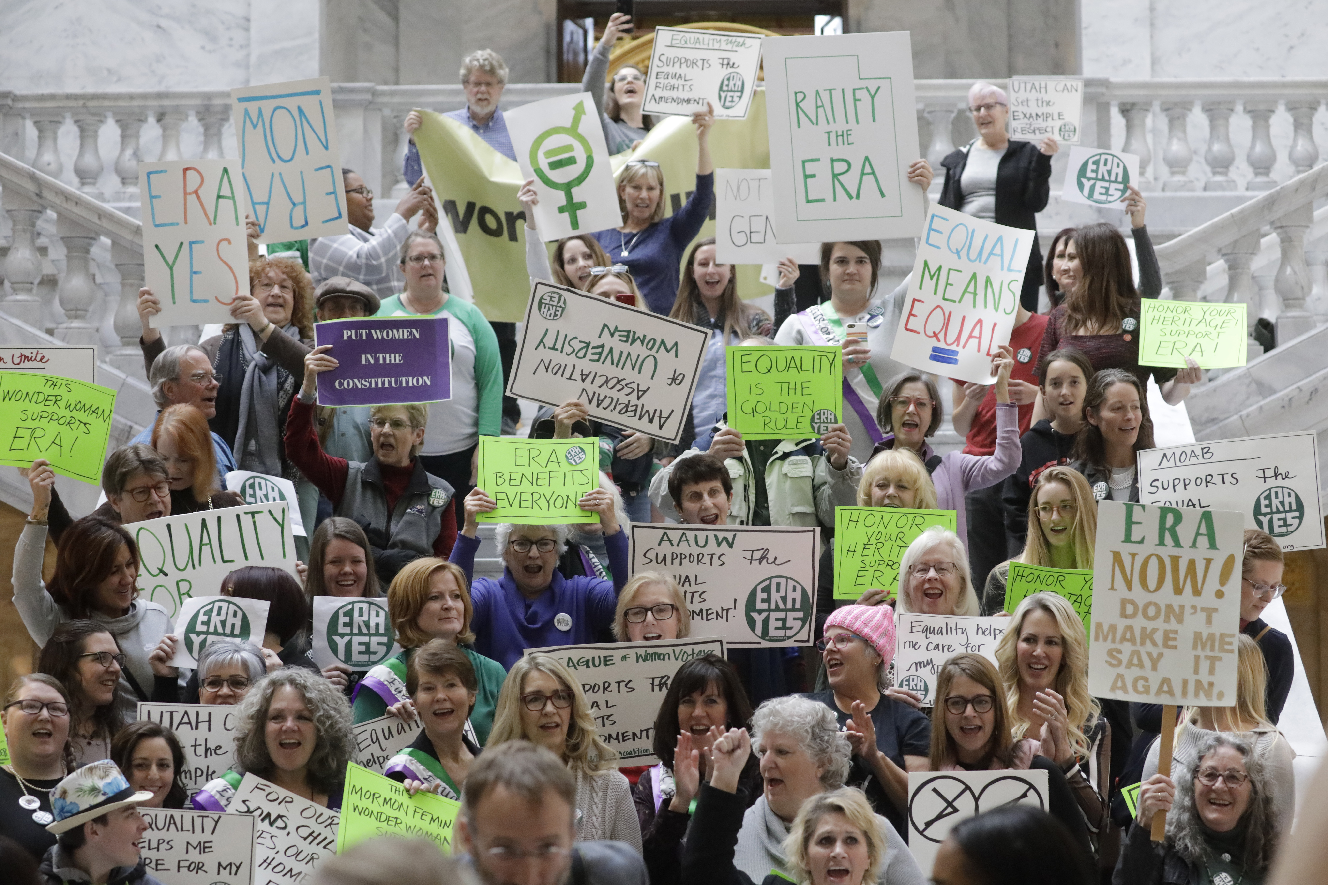 FILE - Equal Rights Amendment supporters gather during a rally at the Utah State Capitol, in Salt Lake City on Tuesday, Dec. 3, 2019. (AP Photo/Rick Bowmer, File)