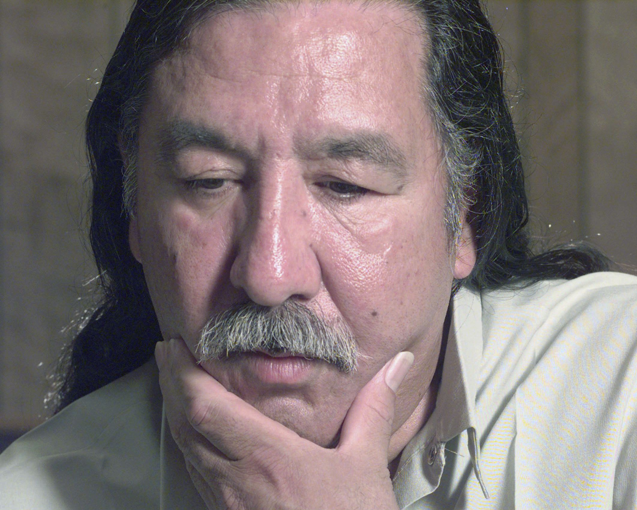 FILE - American Indian activist Leonard Peltier speaks during an interview at the U.S. Penitentiary at Leavenworth, Kan., April 29, 1999. (Joe Ledford/The Kansas City Star via AP, File)