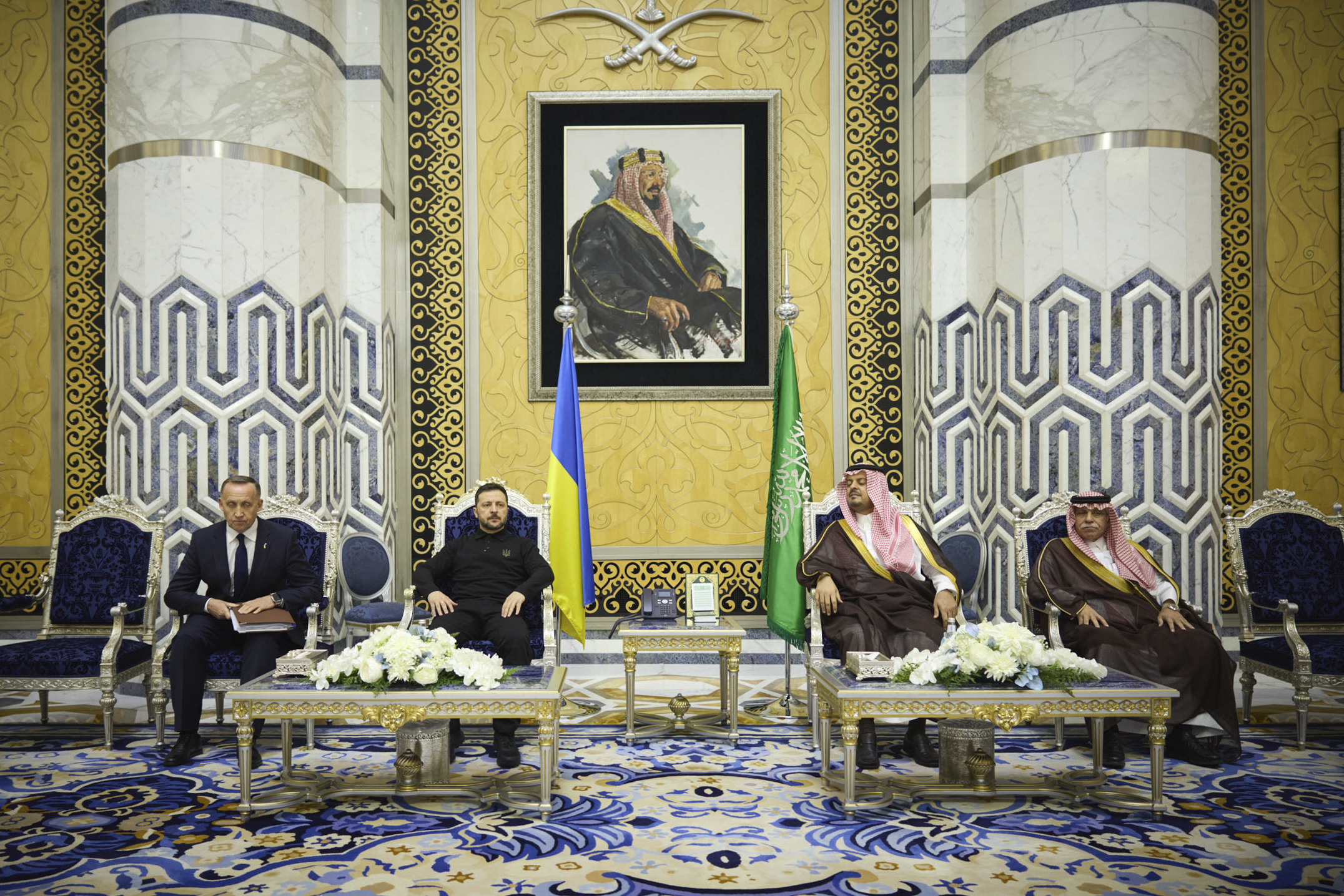 In this photo provided by the Ukrainian Presidential Press Office, Ukrainian President Volodymyr Zelenskyy, center left, meets with Prince Saud bin Mishaal, deputy governor of Saudi Arabia's Mecca region, center right, and Saudi Commerce Minister Majid bin Abdullah al-Qasabi in Riyadh, Saudi Arabia, Monday, March 10, 2025. (Ukrainian Presidential Press Office via AP)