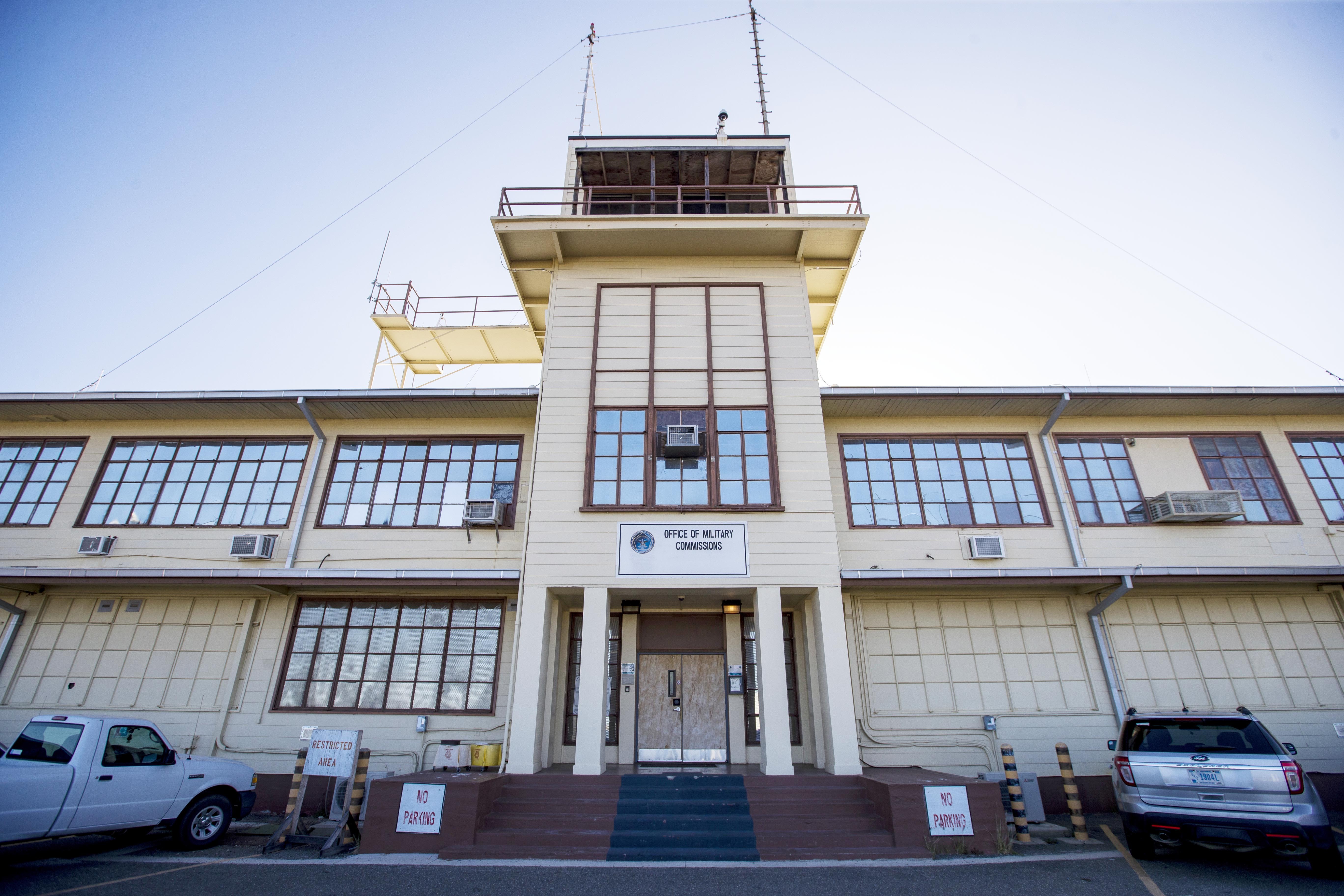 FILE - In this photo reviewed by U.S. military officials, the Office of Military Commissions building used for Periodic Review Board hearings stands, on April 18, 2019, in Guantanamo Bay Naval Base, Cuba. (AP Photo/Alex Brandon, File)