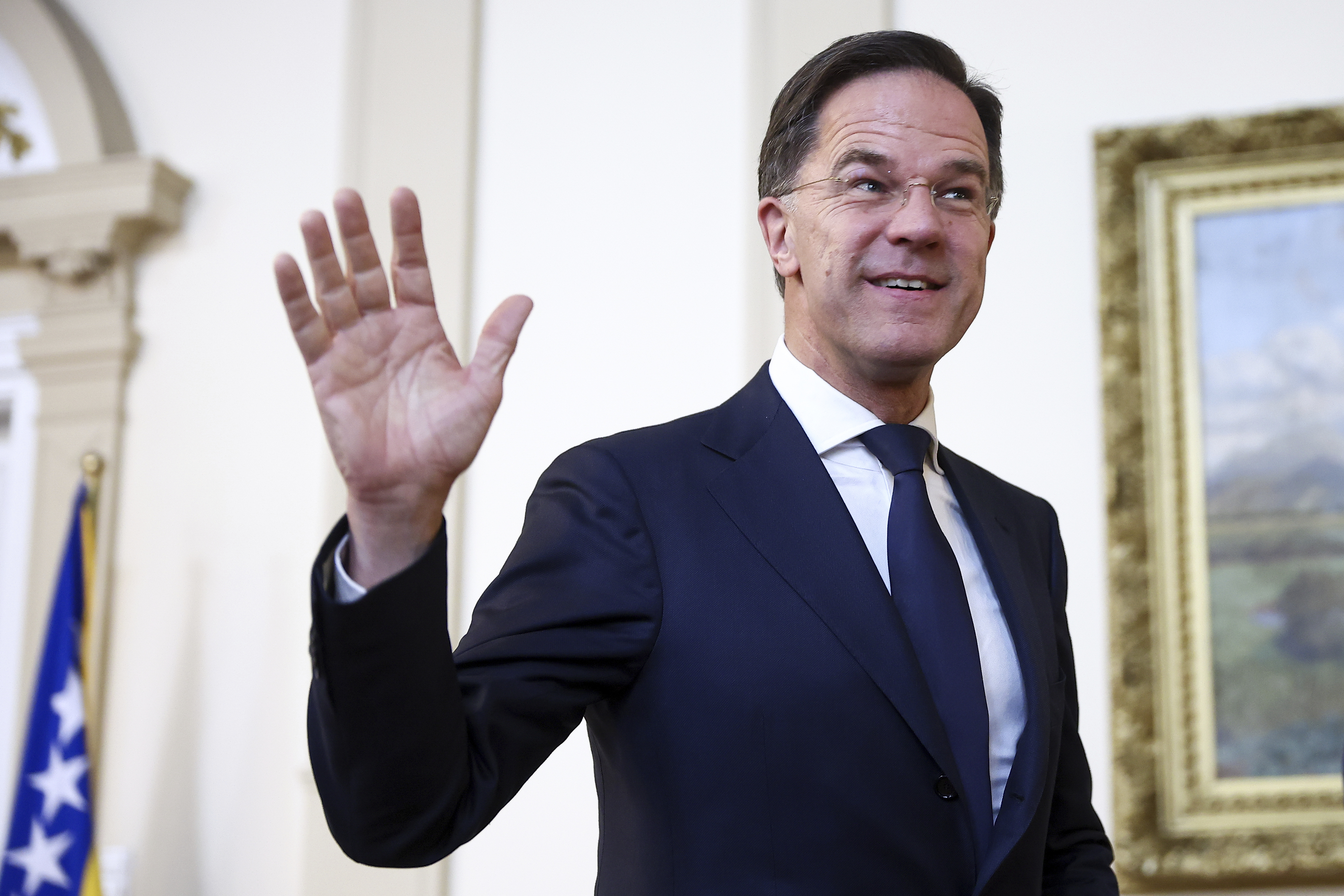 NATO Secretary General Mark Rutte waves to the members of the media prior to the start of his meeting with the members of the Bosnian Presidency in Sarajevo, Bosnia, Monday, March 10, 2025. (AP Photo/Armin Durgut)