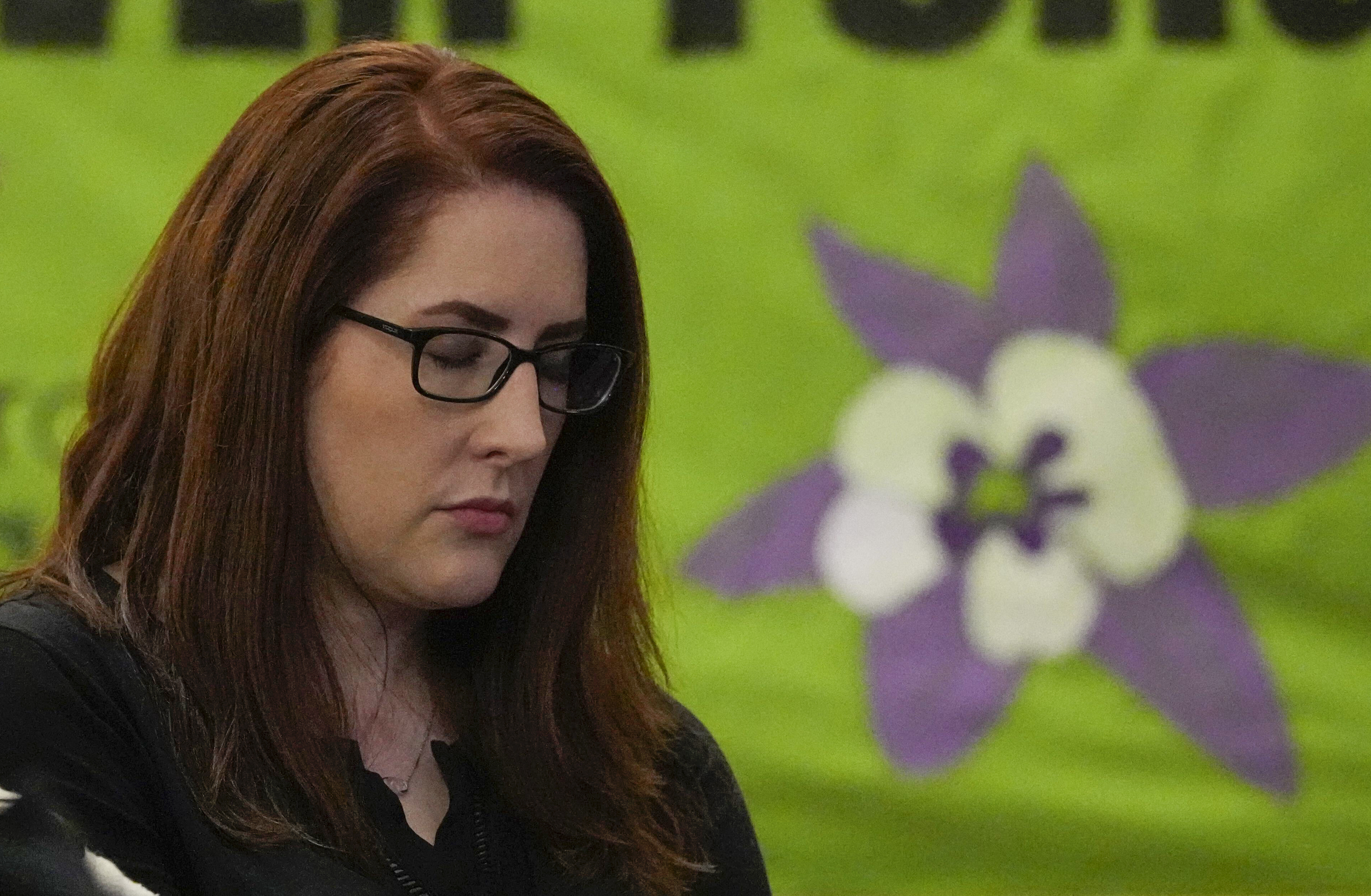 FILE - Columbine High School shooting survivor Anne Marie Hochhalter attends a vigil for the 25th anniversary of the mass shooting, April 19, 2024, in Denver. (AP Photo/Jack Dempsey, File)